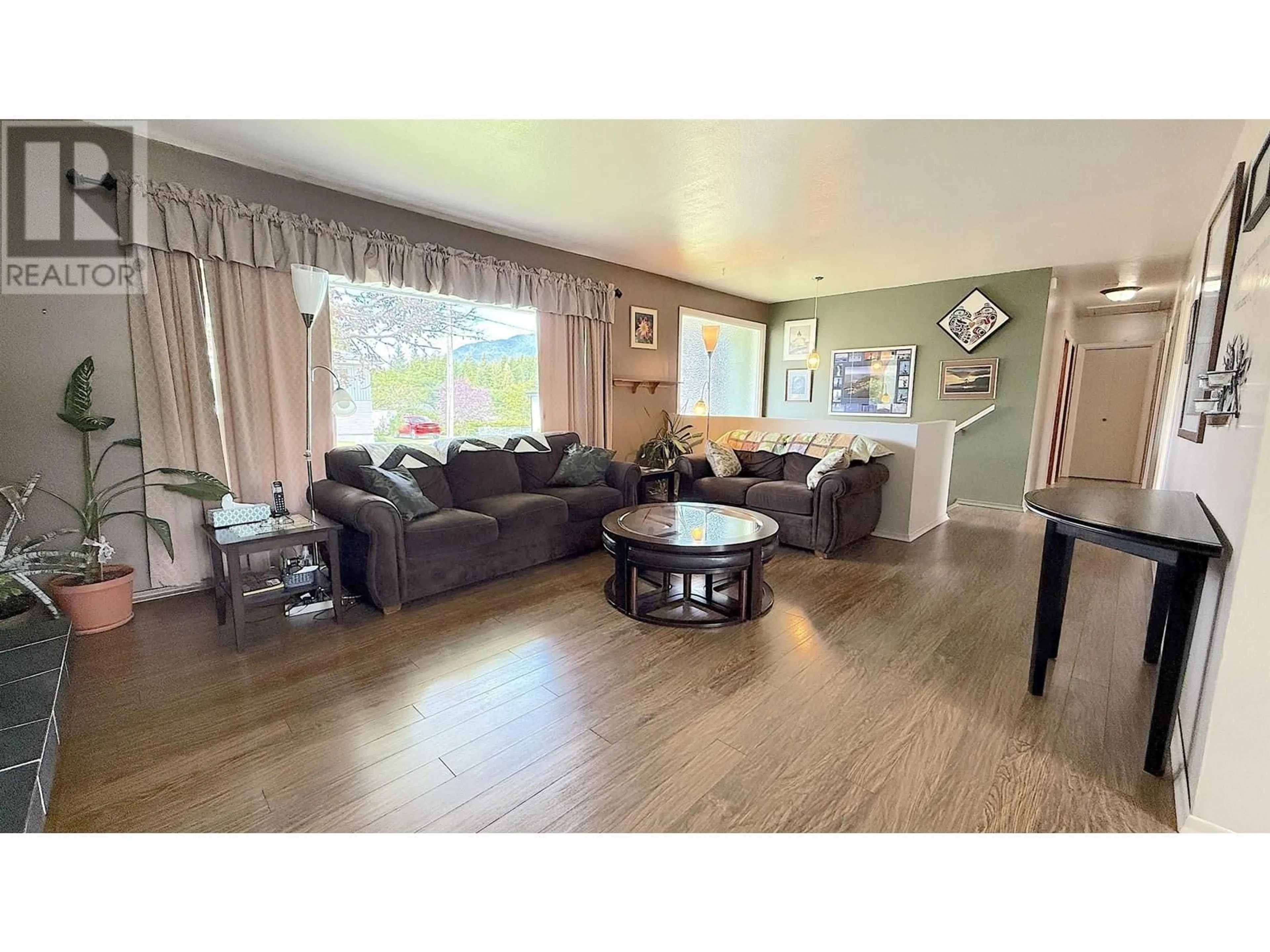 Living room with furniture, wood/laminate floor for 1656 INDIA AVENUE, Prince Rupert British Columbia V8J2Y3