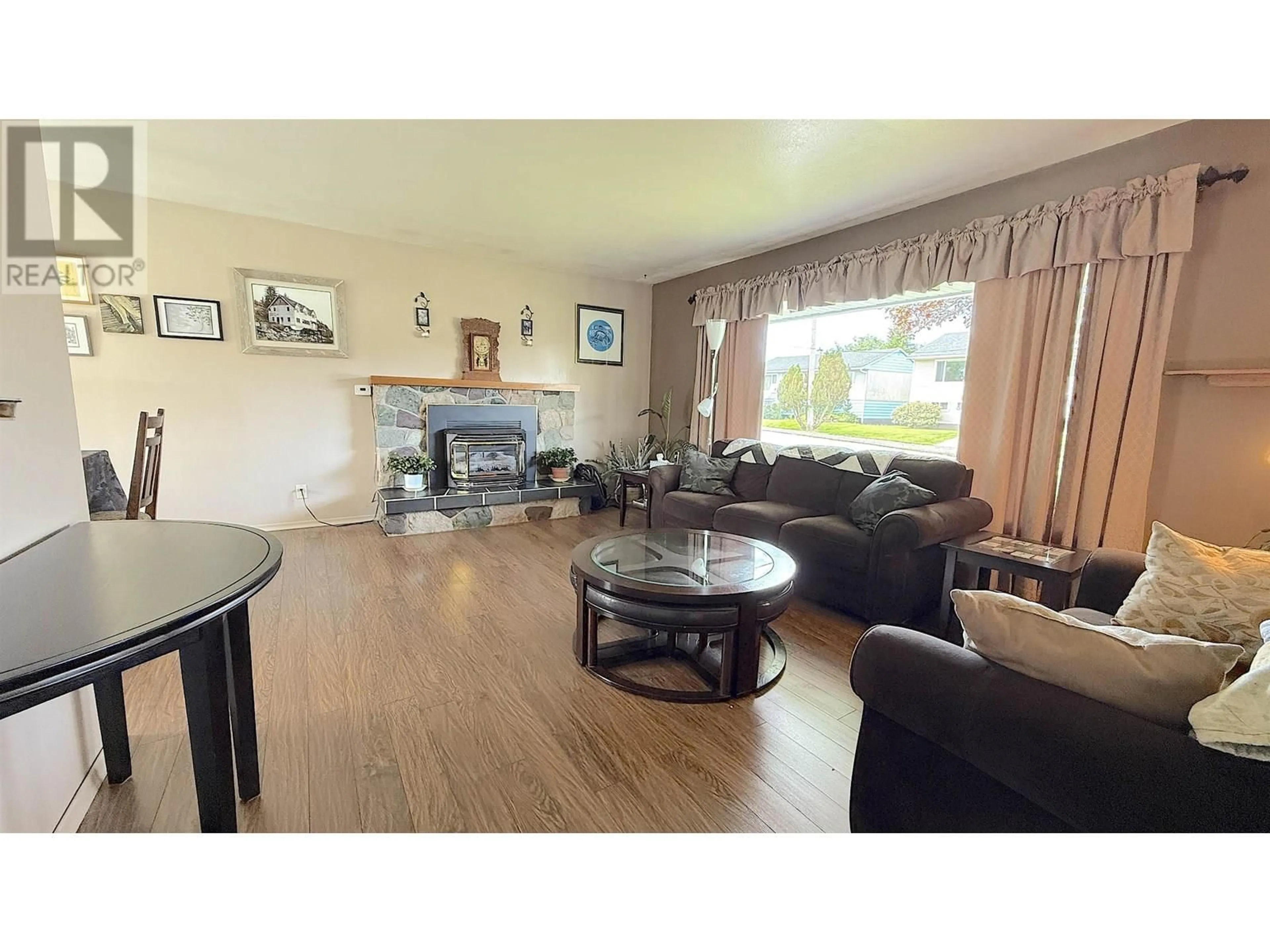 Living room with furniture, wood/laminate floor for 1656 INDIA AVENUE, Prince Rupert British Columbia V8J2Y3
