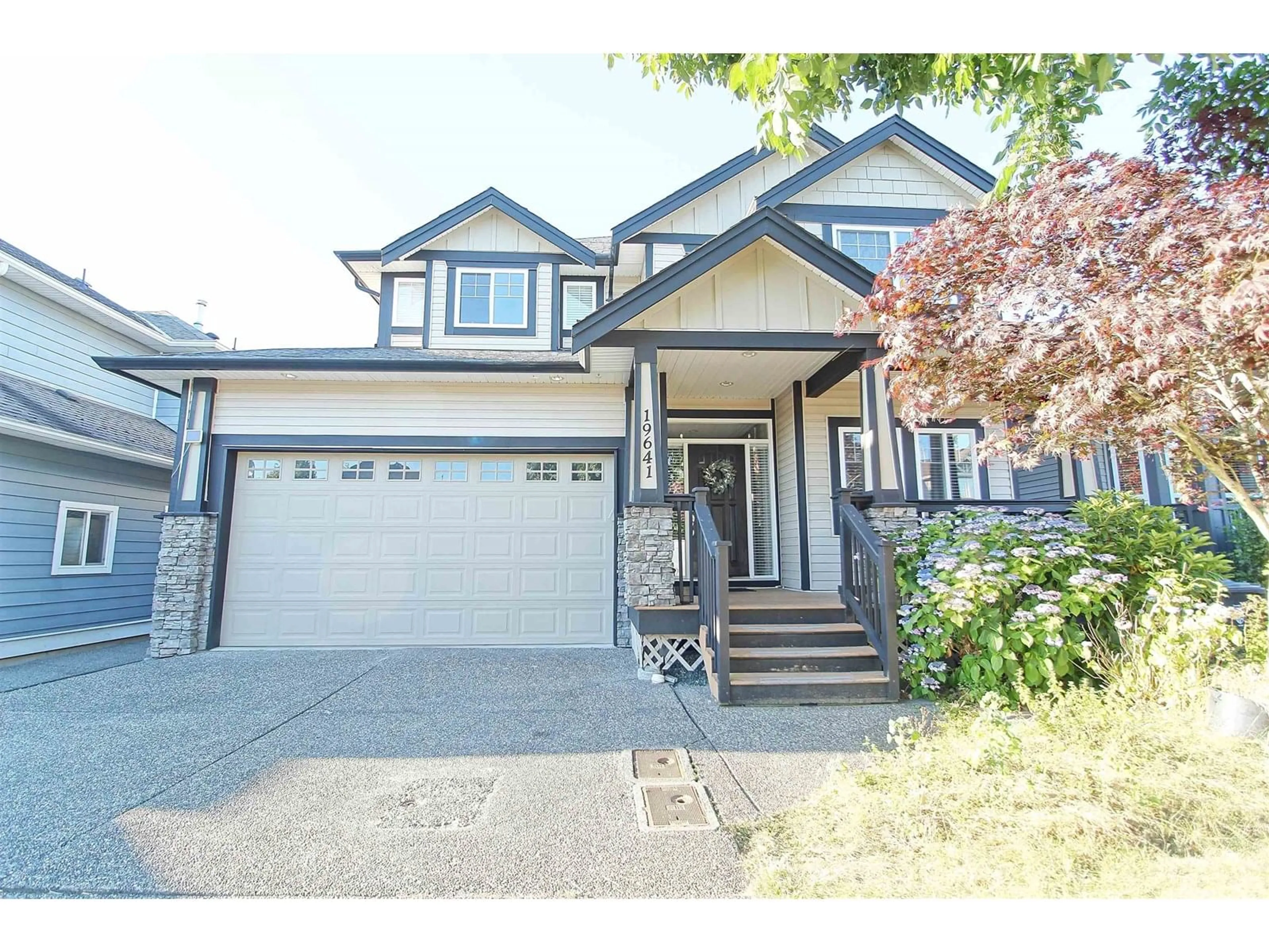 Home with vinyl exterior material, street for 19641 73A, Langley British Columbia V2Y3C4