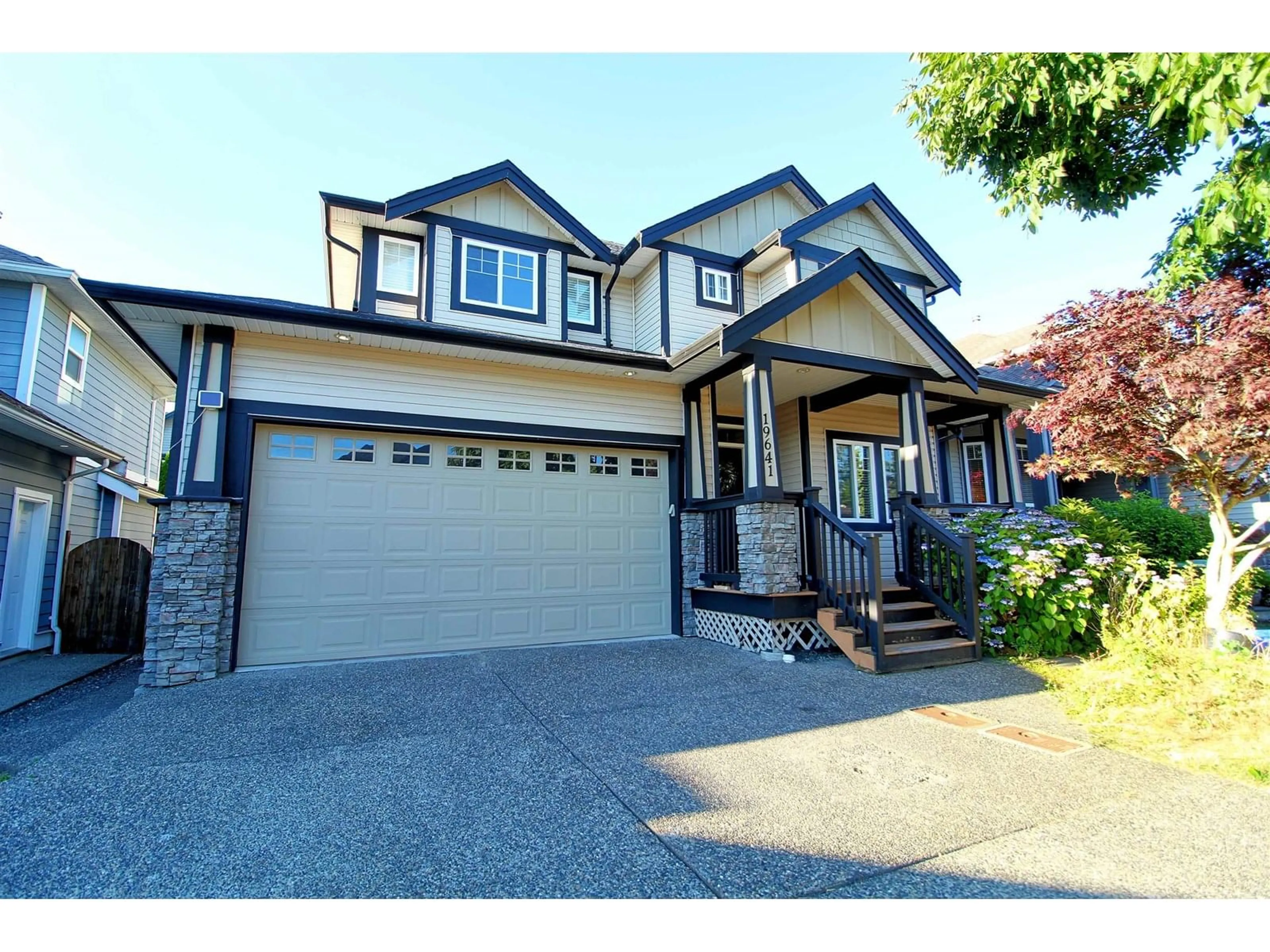 Home with vinyl exterior material, street for 19641 73A, Langley British Columbia V2Y3C4