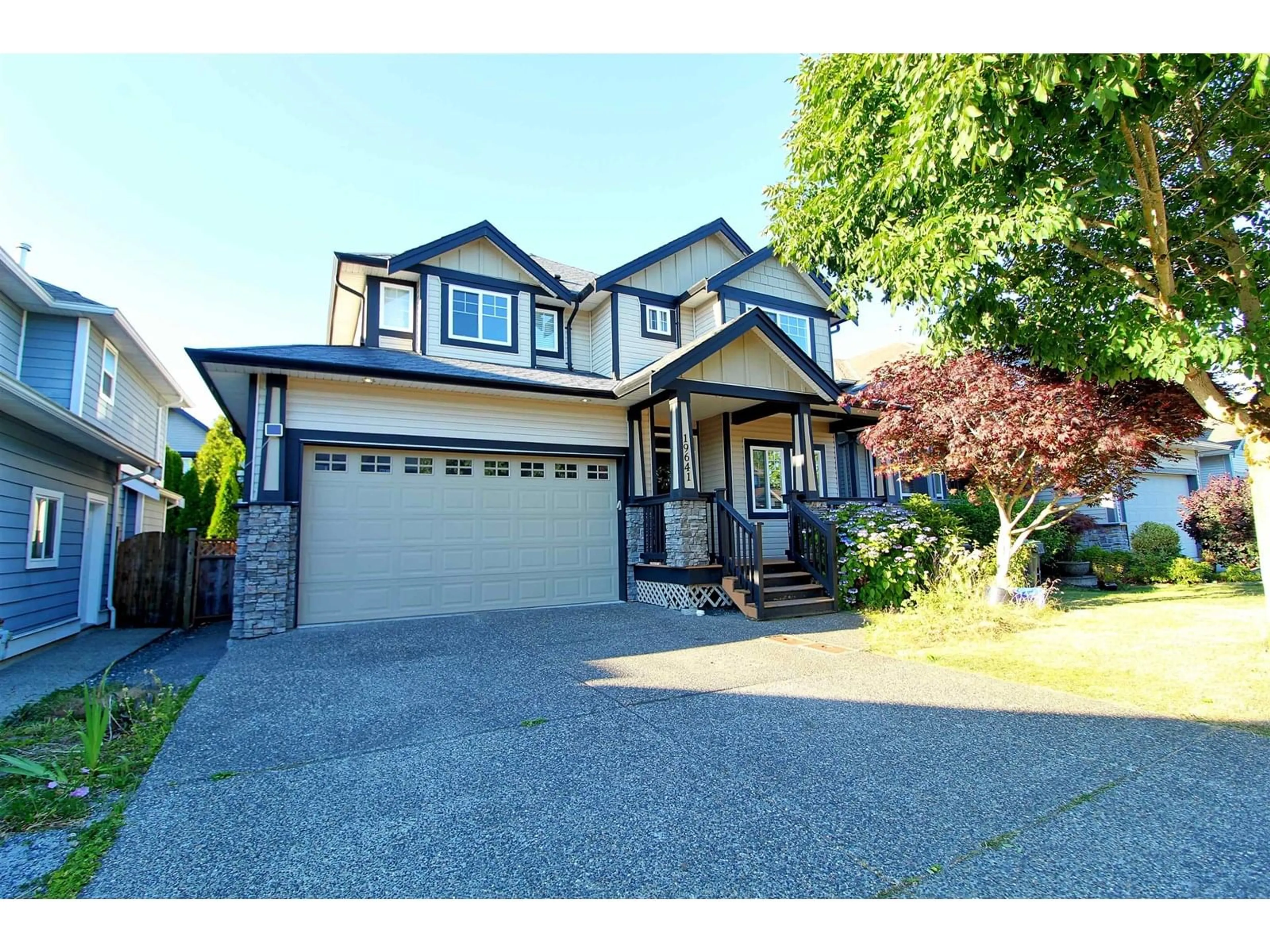 Home with vinyl exterior material, street for 19641 73A, Langley British Columbia V2Y3C4