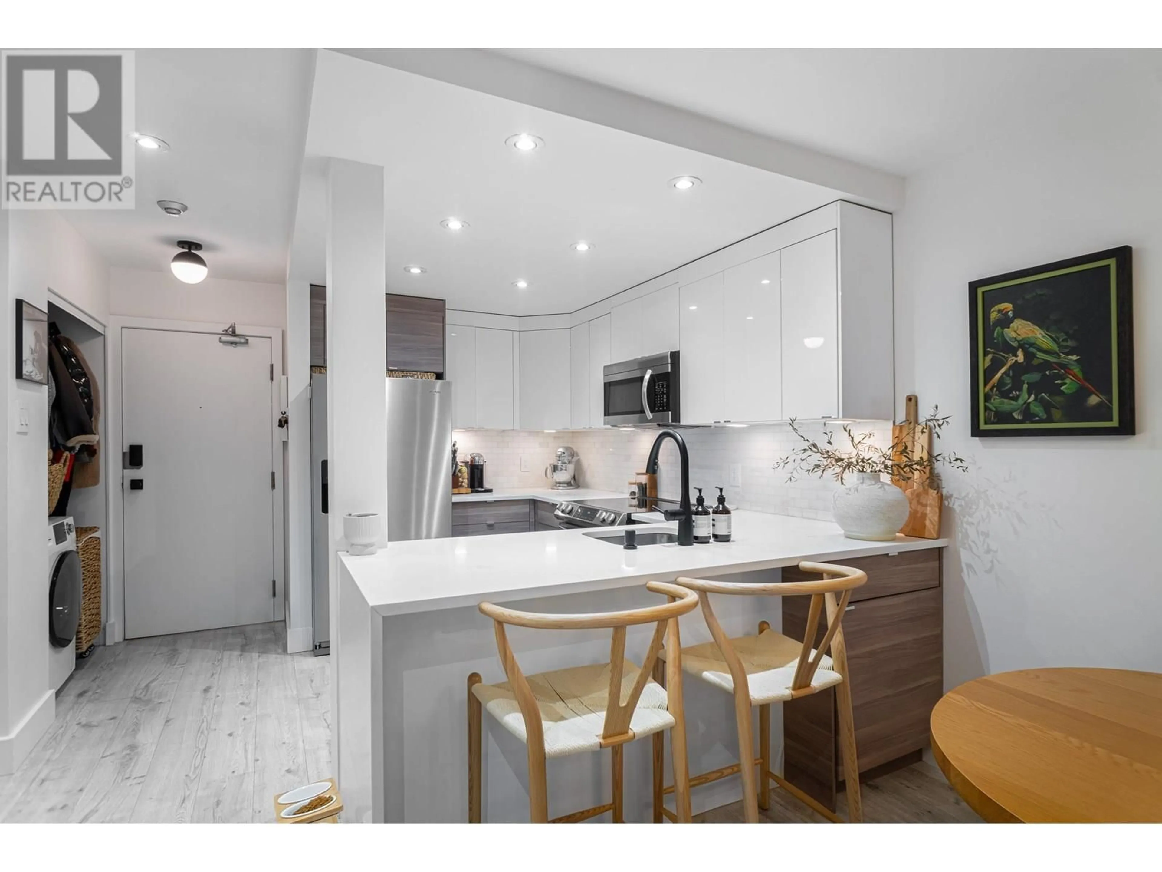 Open concept kitchen, unknown for 307 - 1345 COMOX STREET, Vancouver British Columbia V6E4E4