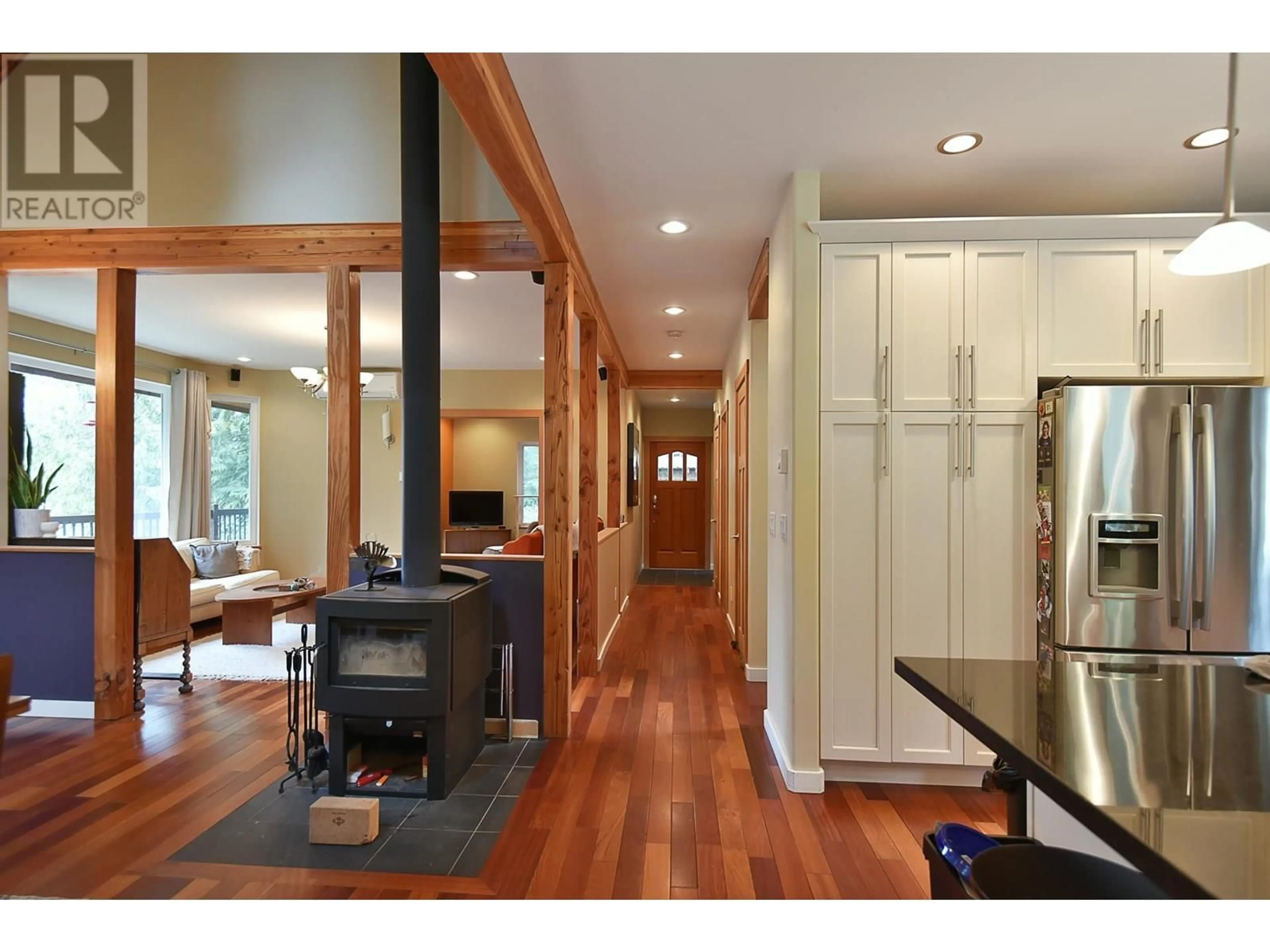 Open concept kitchen, wood/laminate floor for 5062 PARKVIEW ROAD, Pender Harbour British Columbia V0N2H1