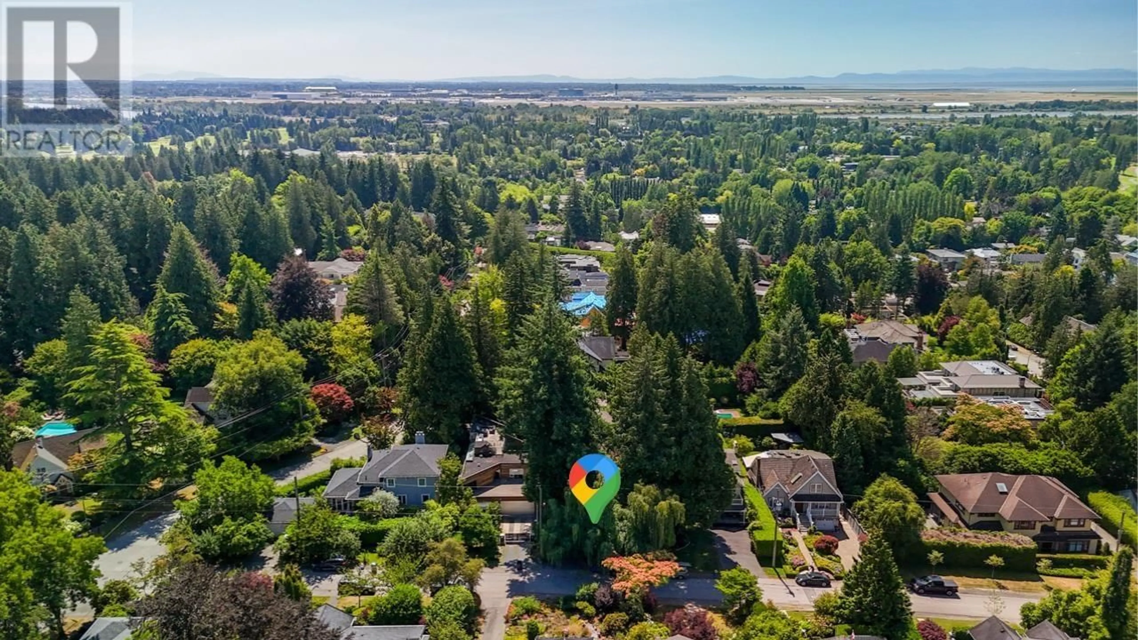 A pic from outside/outdoor area/front of a property/back of a property/a pic from drone, water/lake/river/ocean view for 3060 45TH AVENUE, Vancouver British Columbia V6N3M1