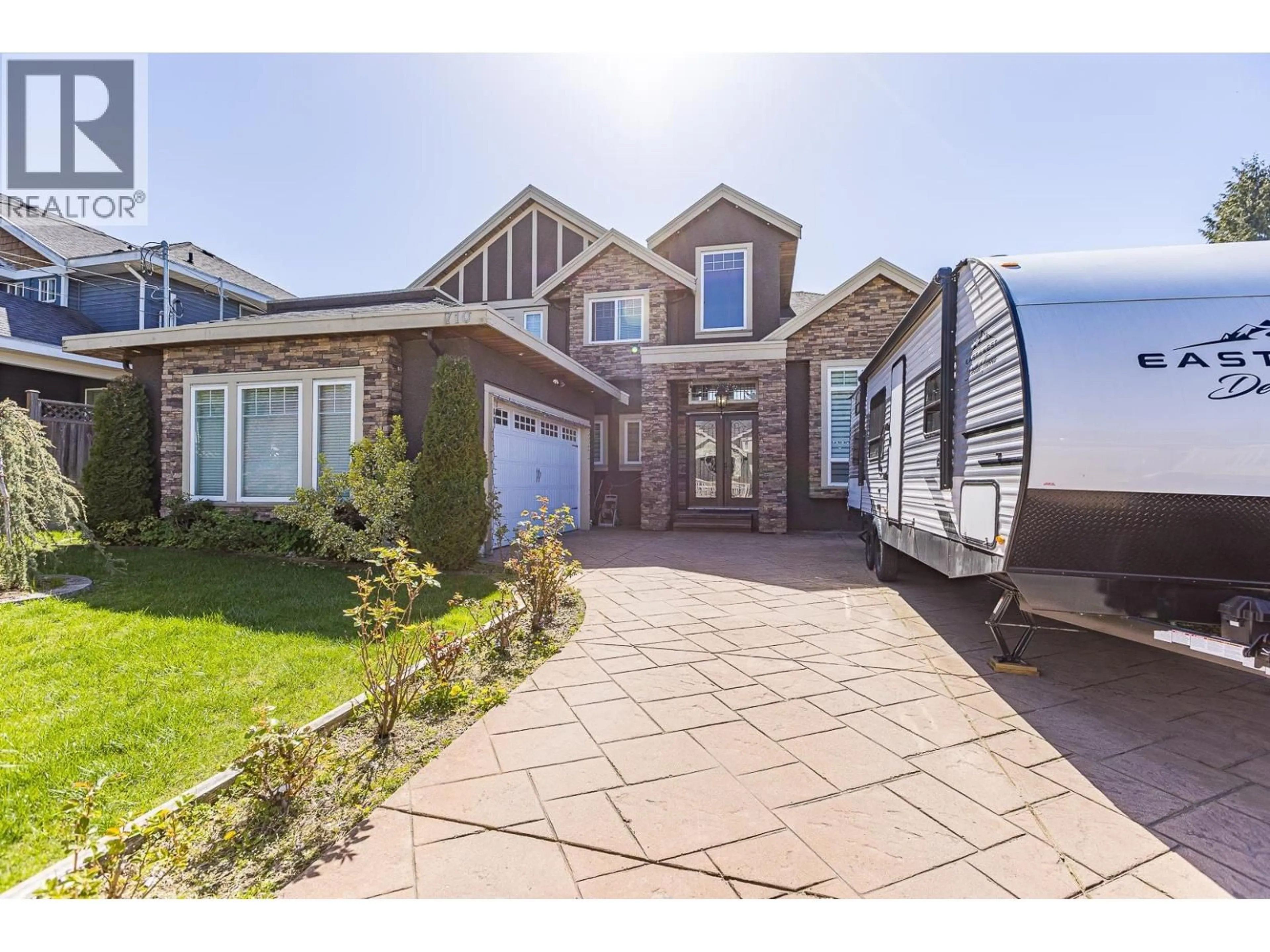 Home with vinyl exterior material, street for 710 RODERICK AVENUE, Coquitlam British Columbia V3K1P5