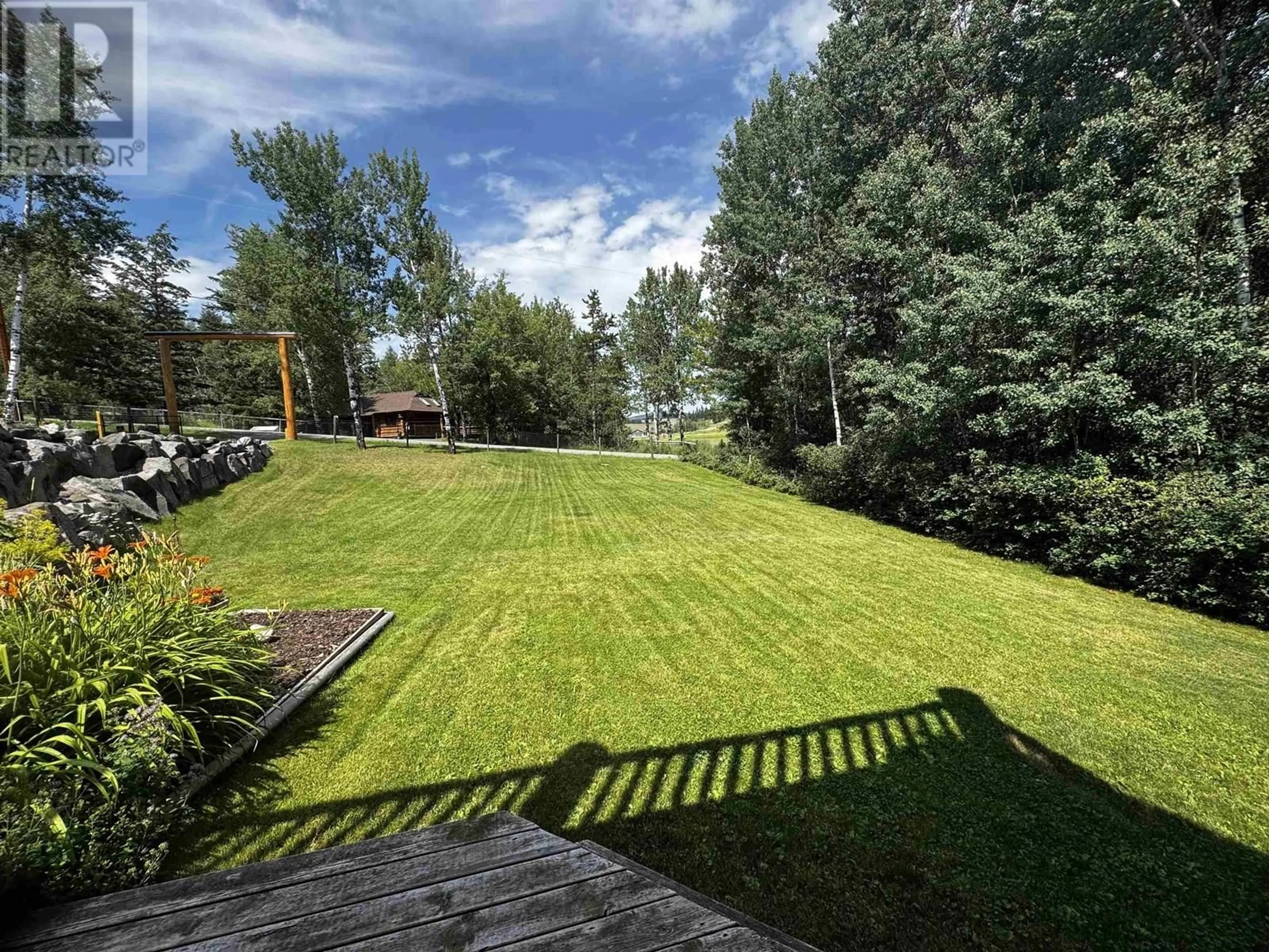 A pic from outside/outdoor area/front of a property/back of a property/a pic from drone, forest/trees view for 5462 ELLIOT LAKE ROAD, 100 Mile House British Columbia V0K2E1