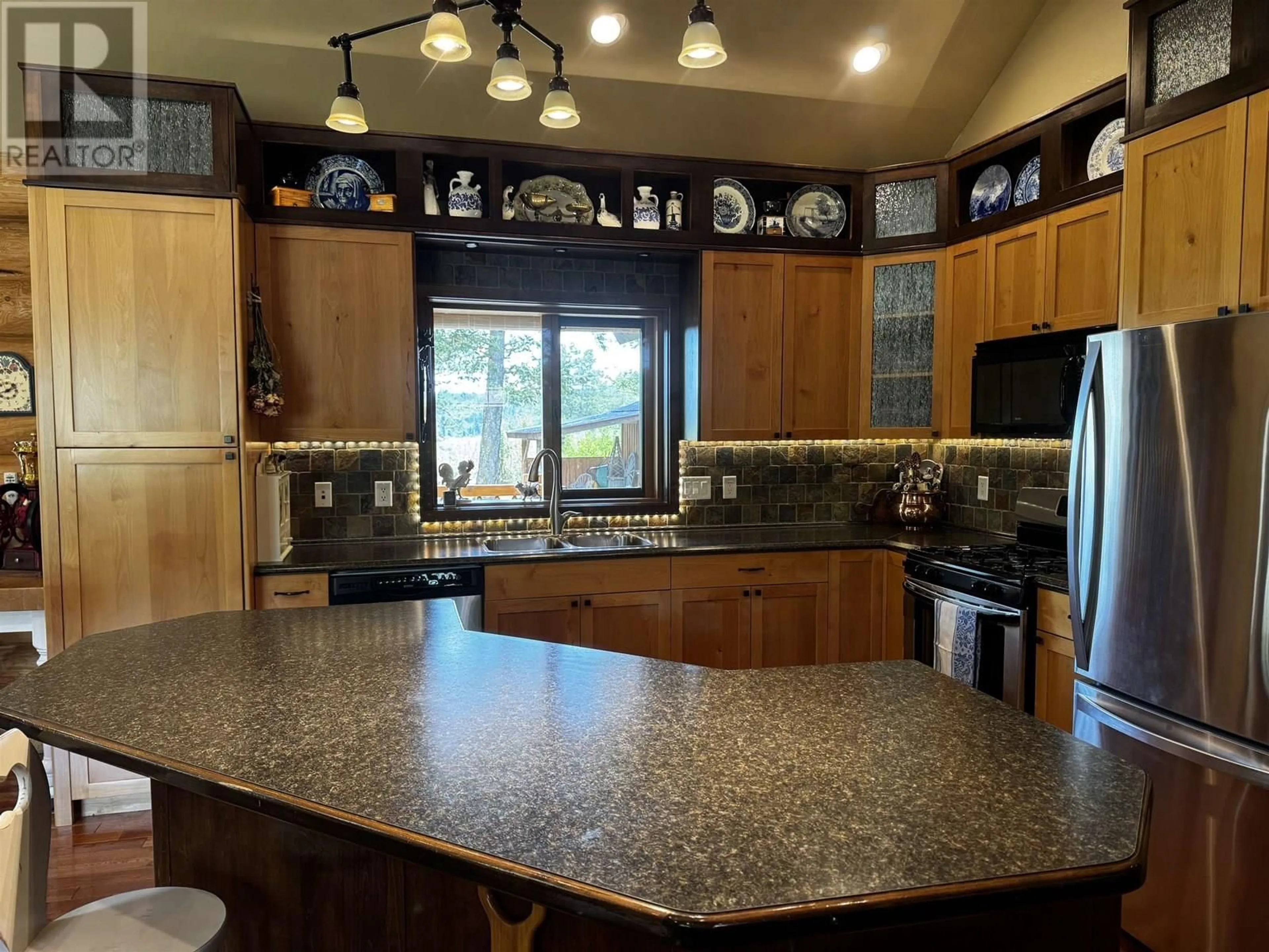 Open concept kitchen, ceramic/tile floor for 5462 ELLIOT LAKE ROAD, 100 Mile House British Columbia V0K2E1