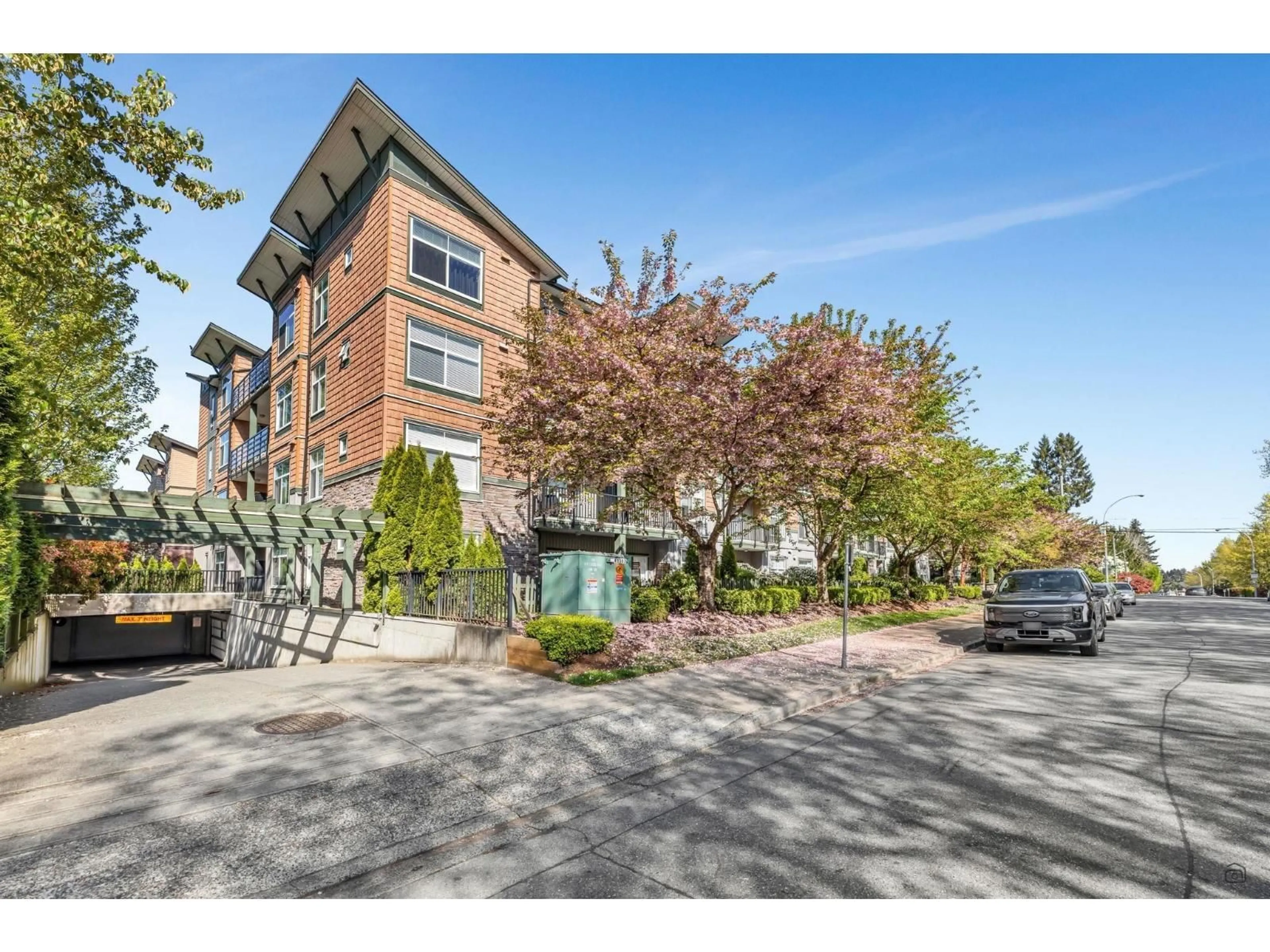 A pic from outside/outdoor area/front of a property/back of a property/a pic from drone, street for 305 - 8183 121A, Surrey British Columbia V3W1S7