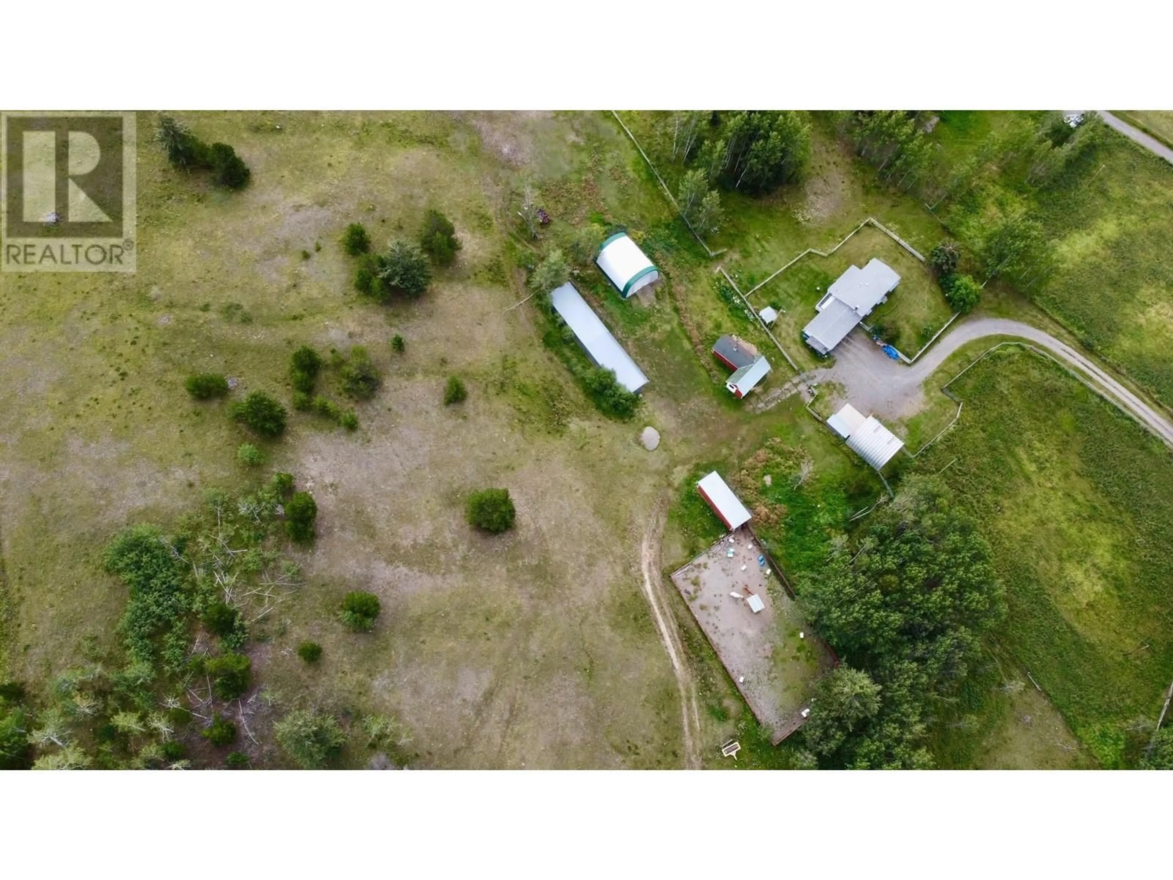 A pic from outside/outdoor area/front of a property/back of a property/a pic from drone, unknown for 5363 DAWSON ROAD, 103 Mile House British Columbia V0K2E1