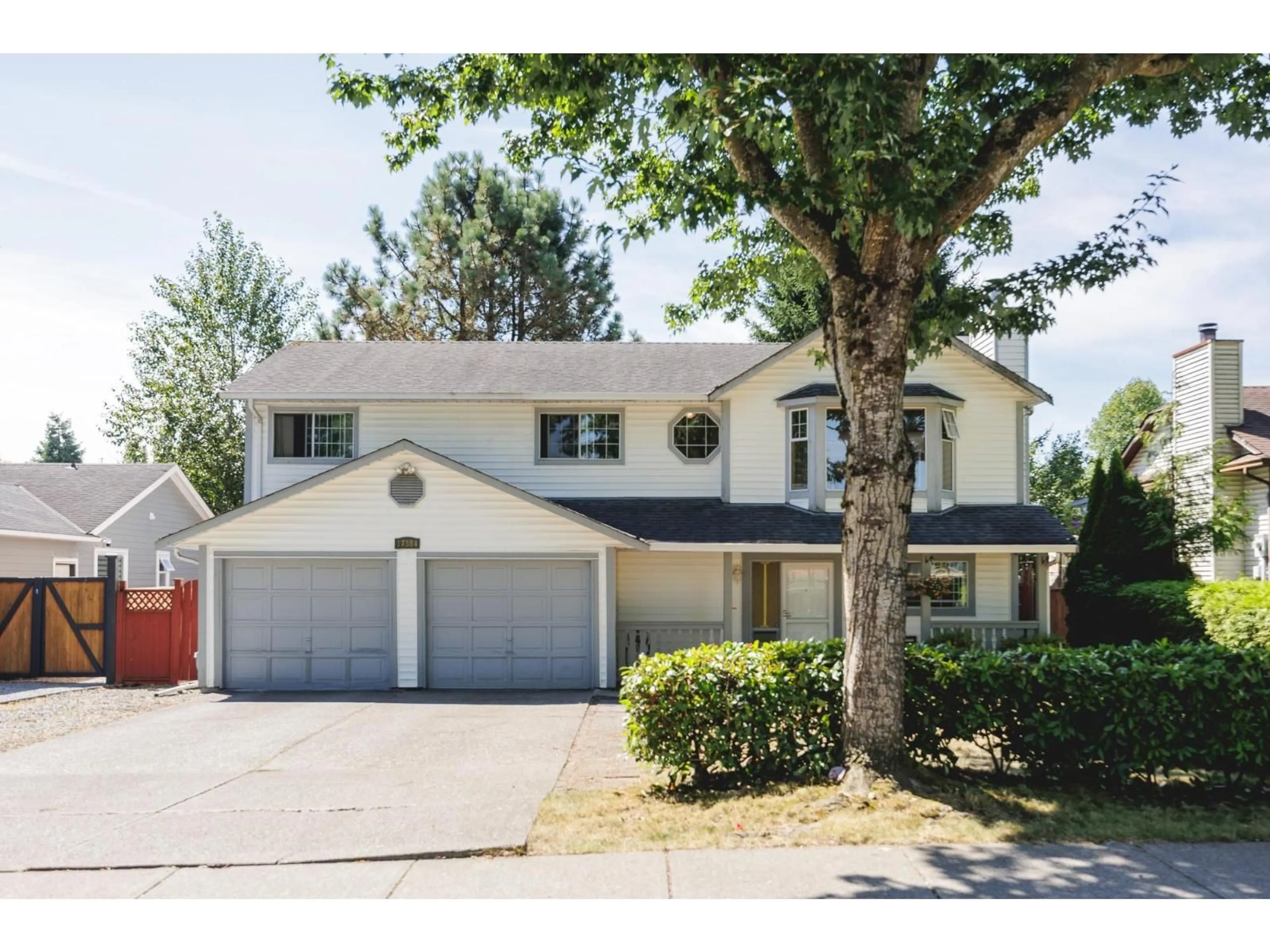 Home with vinyl exterior material, street for 17384 61A, Surrey British Columbia V3S6Y2