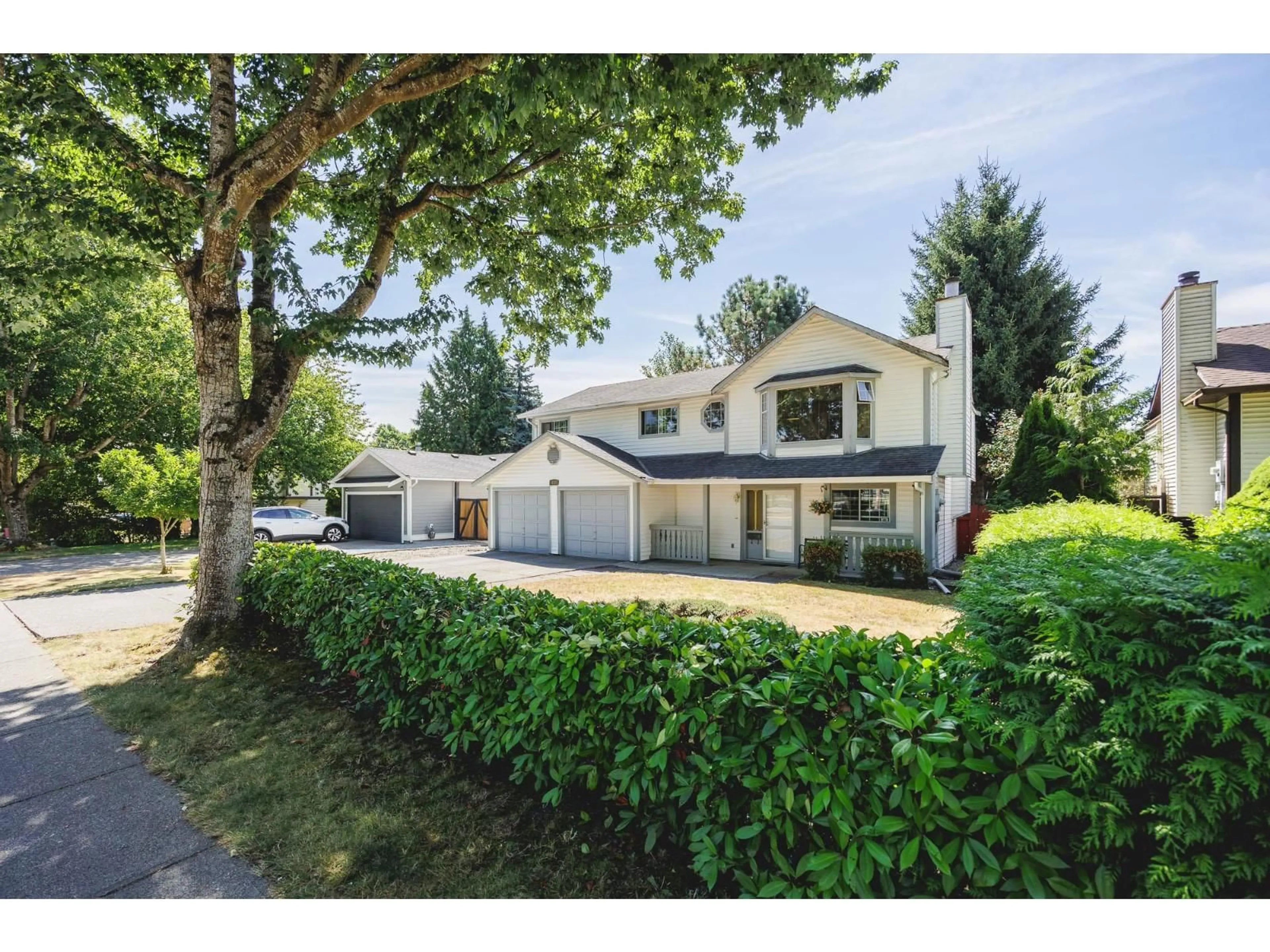 A pic from outside/outdoor area/front of a property/back of a property/a pic from drone, street for 17384 61A, Surrey British Columbia V3S6Y2