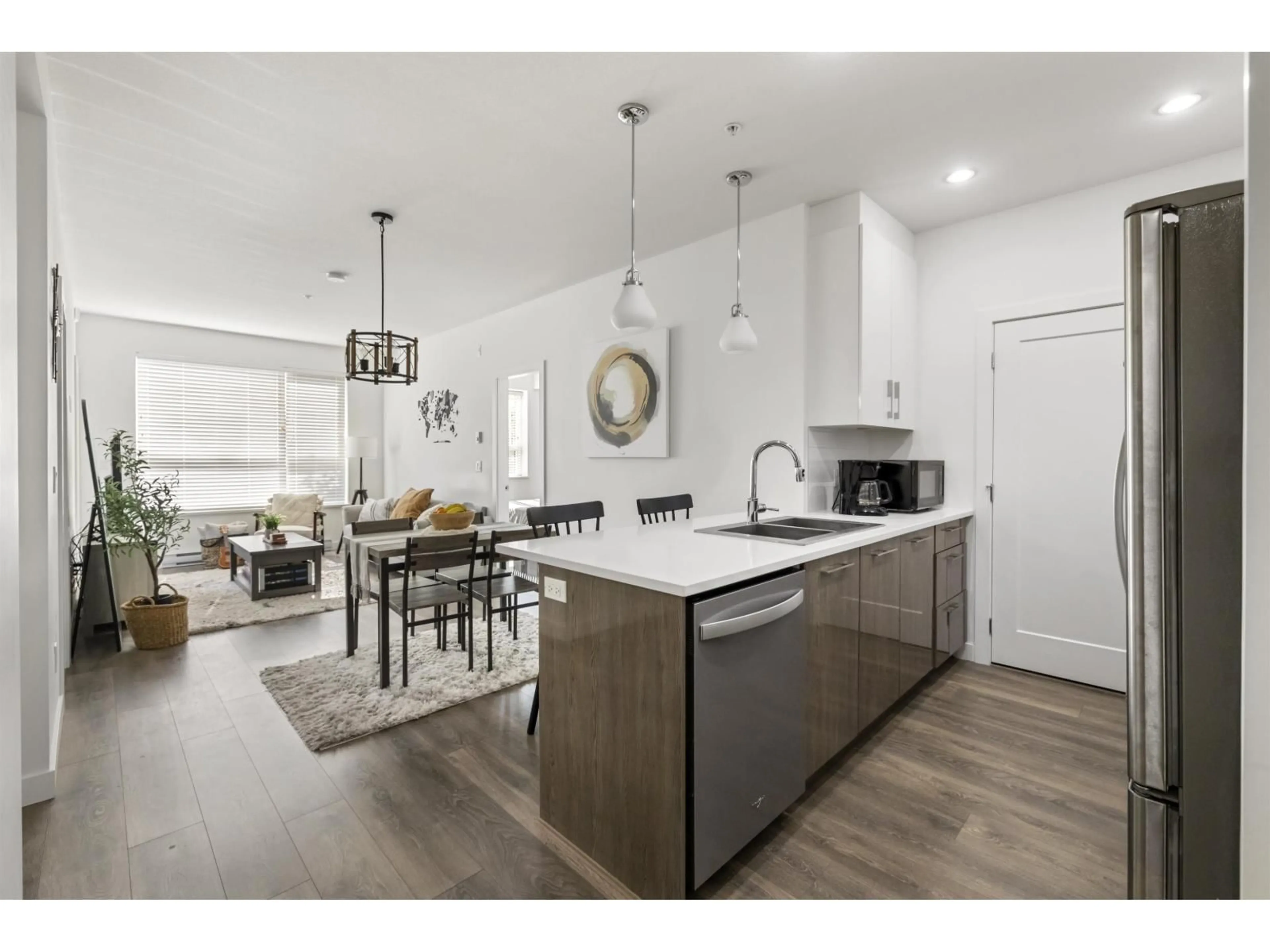 Open concept kitchen, unknown for 210 - 20829 77A, Langley British Columbia V2Y0W7