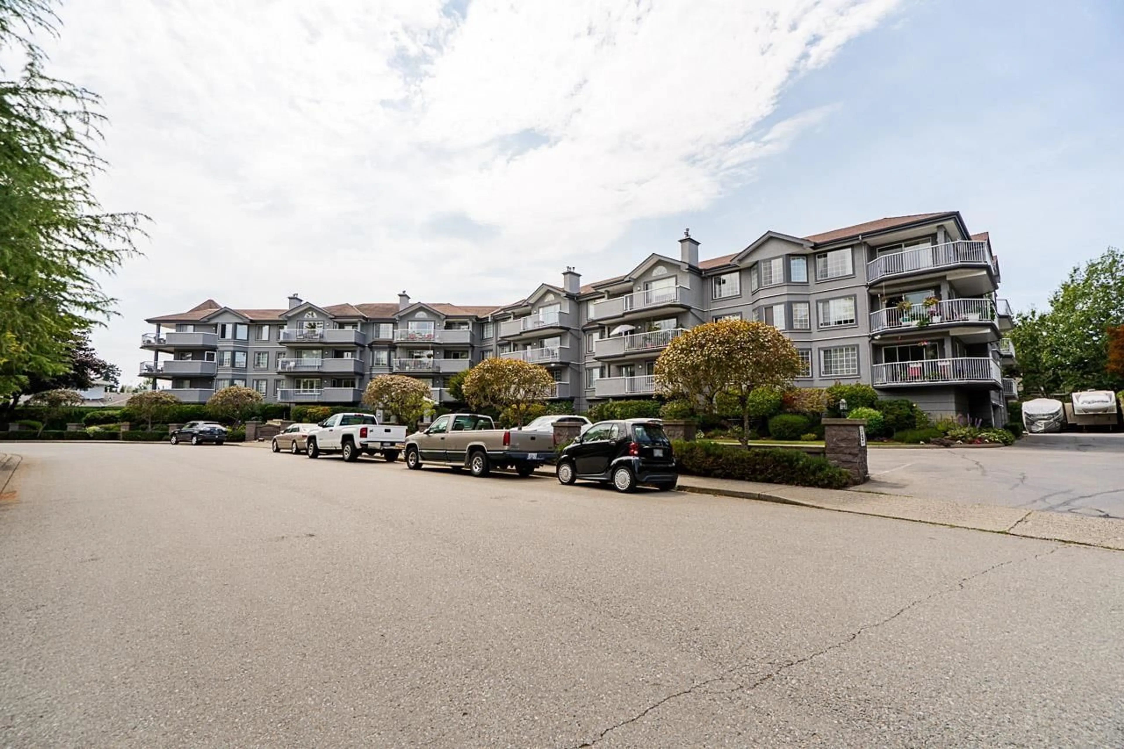 A pic from outside/outdoor area/front of a property/back of a property/a pic from drone, unknown for 303 - 5375 205, Langley British Columbia V3A7V7