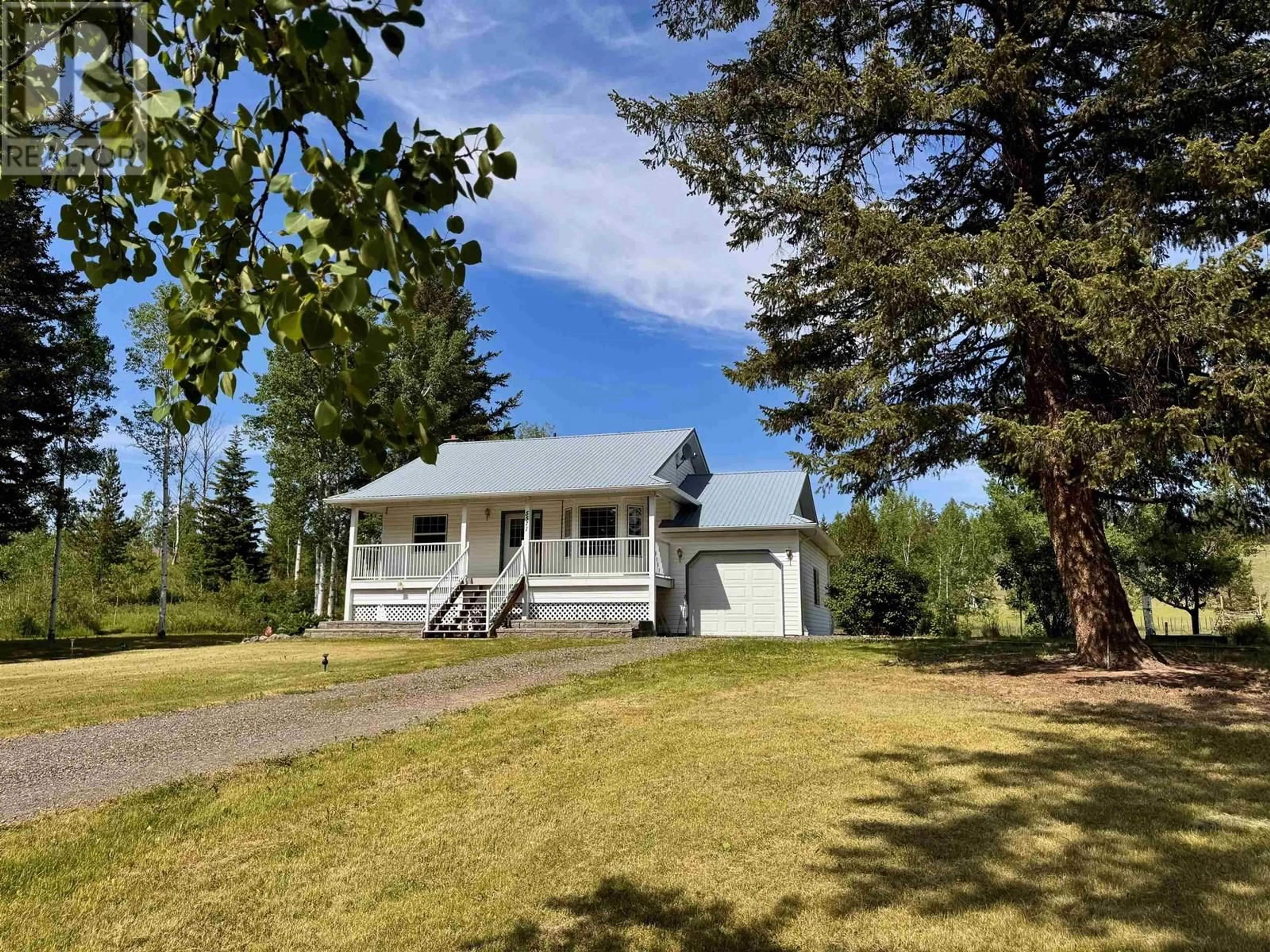 A pic from outside/outdoor area/front of a property/back of a property/a pic from drone, unknown for 5571 LAKESIDE COURT, 103 Mile House British Columbia V0K2E1