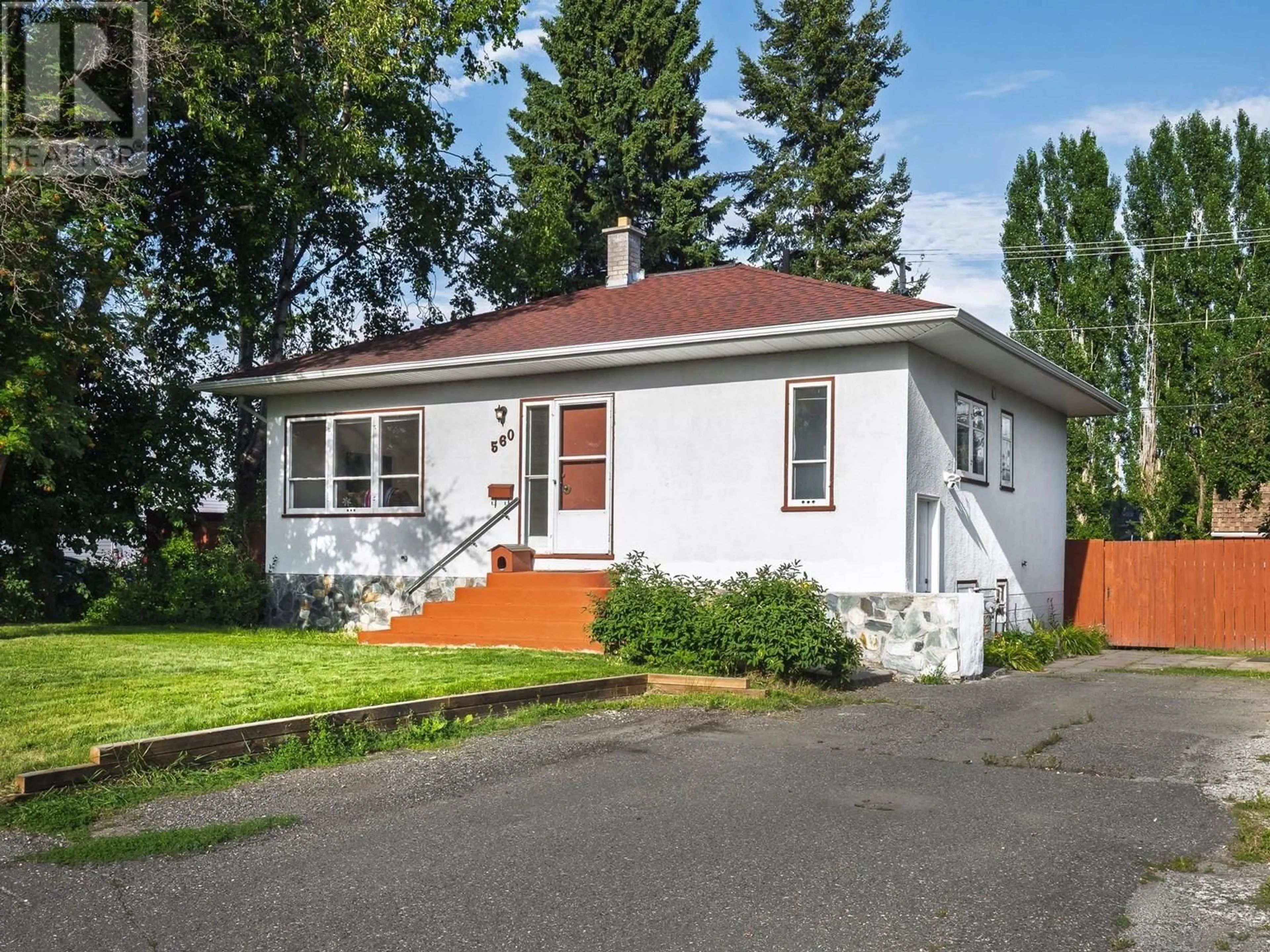 Home with vinyl exterior material, street for 560 WATROUS STREET, Prince George British Columbia V2M2B9