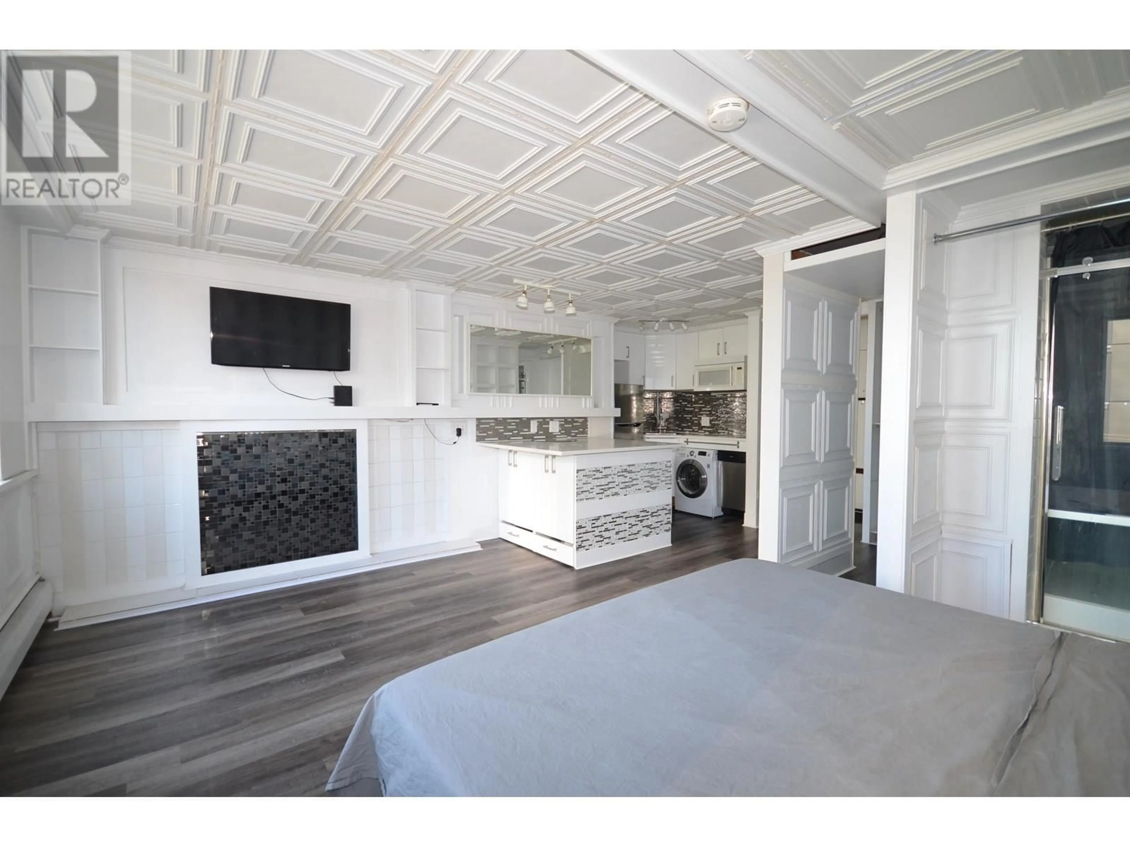 Open concept kitchen, unknown for 401 - 1250 BURNABY STREET, Vancouver British Columbia V6E1P5