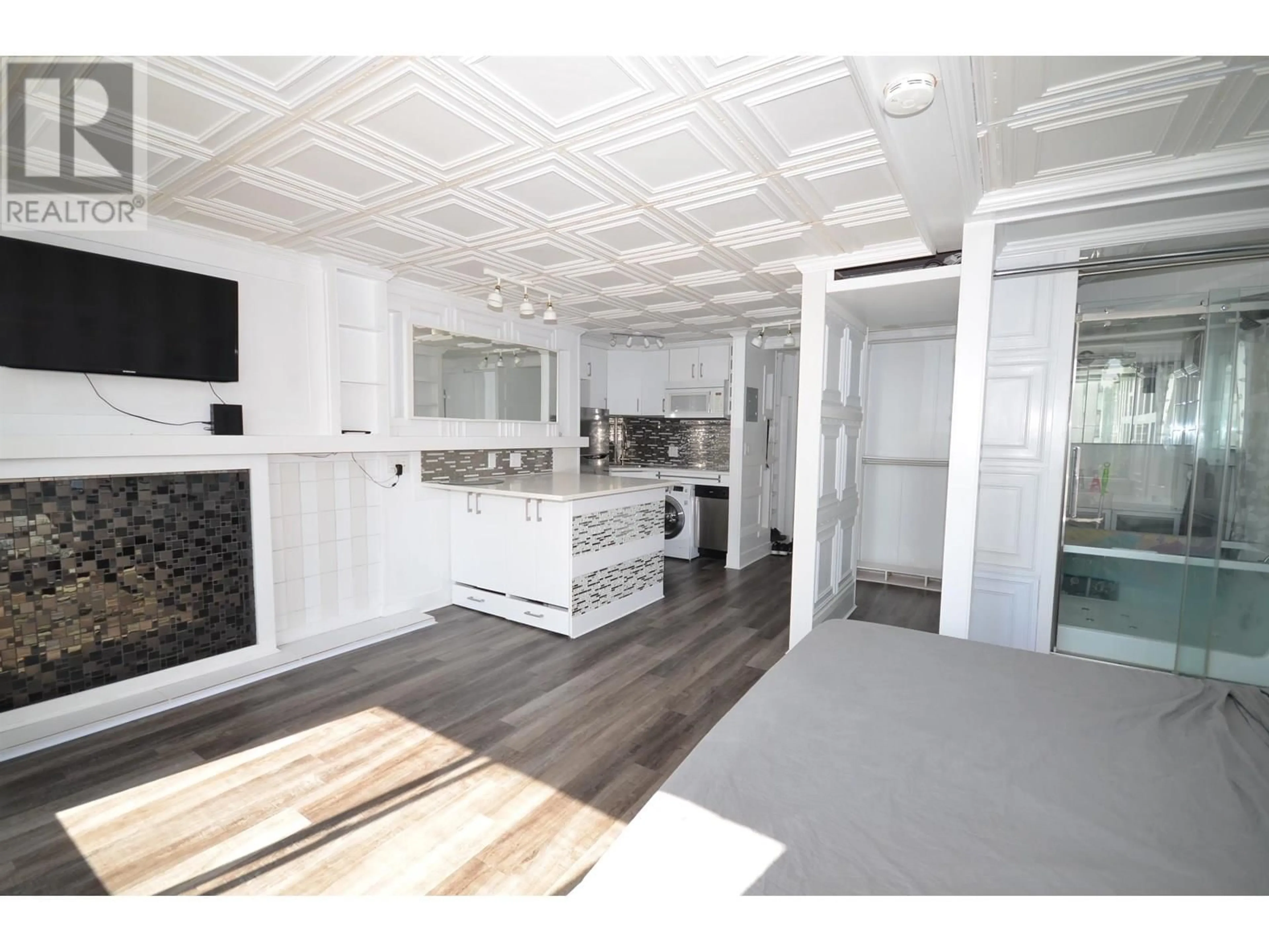 Open concept kitchen, unknown for 401 - 1250 BURNABY STREET, Vancouver British Columbia V6E1P5