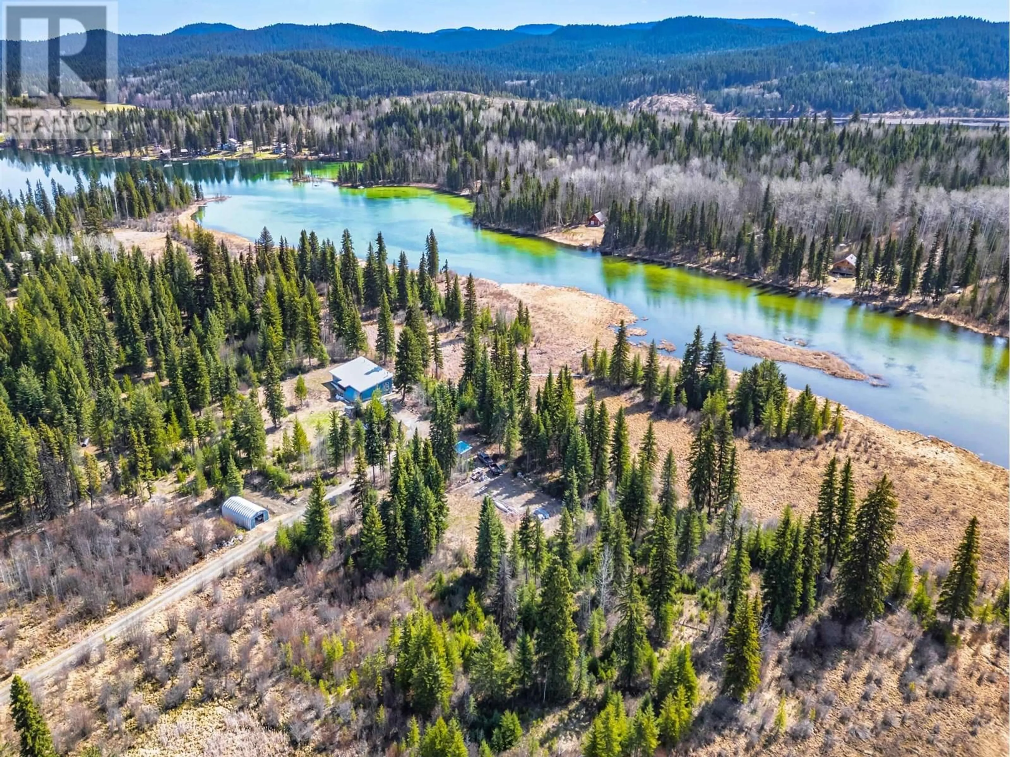 A pic from outside/outdoor area/front of a property/back of a property/a pic from drone, water/lake/river/ocean view for 3999 RUTH LAKE ROAD, Forest Grove British Columbia V0K1M0