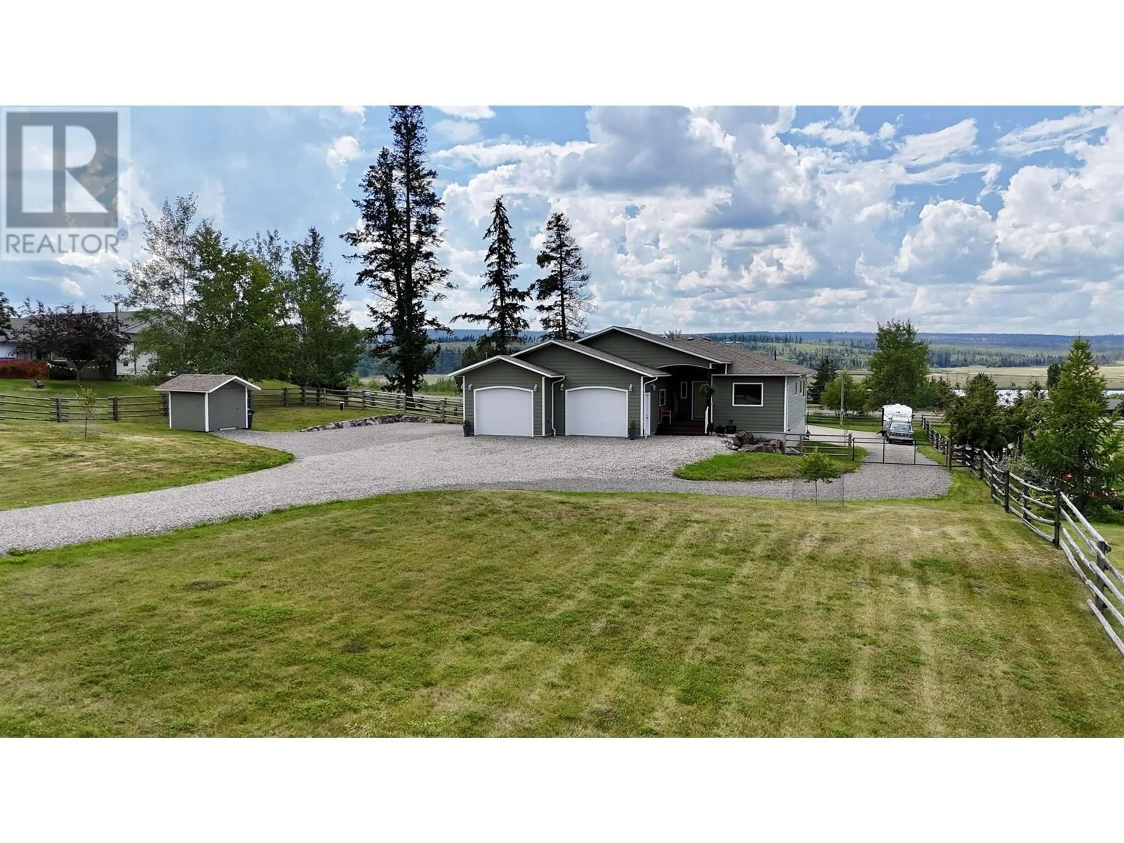 A pic from outside/outdoor area/front of a property/back of a property/a pic from drone, mountain view for 5164 LAKES ROAD, 100 Mile House British Columbia V0K2E1