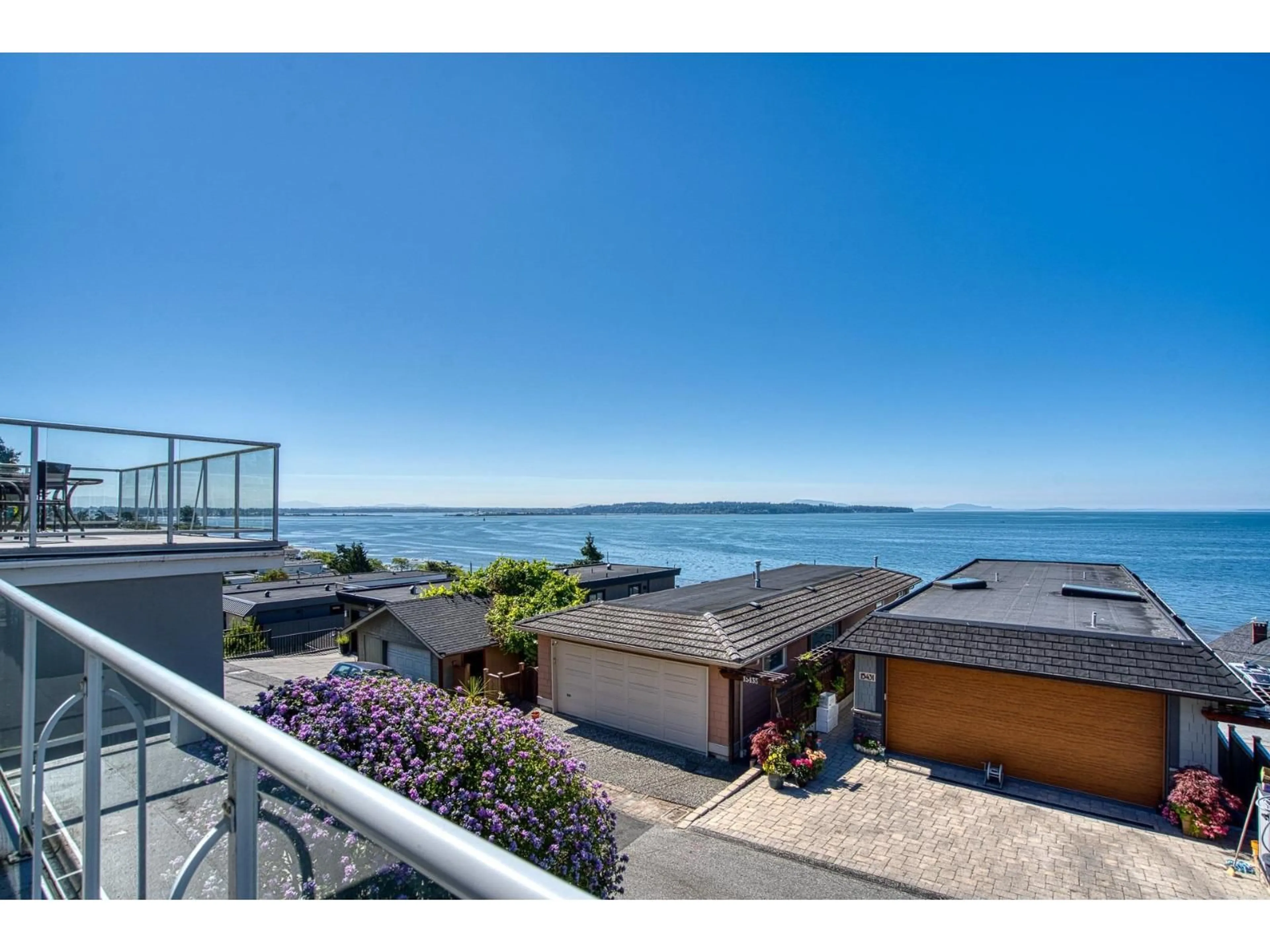 A pic from outside/outdoor area/front of a property/back of a property/a pic from drone, water/lake/river/ocean view for 15464 COLUMBIA, White Rock British Columbia V4B1K2