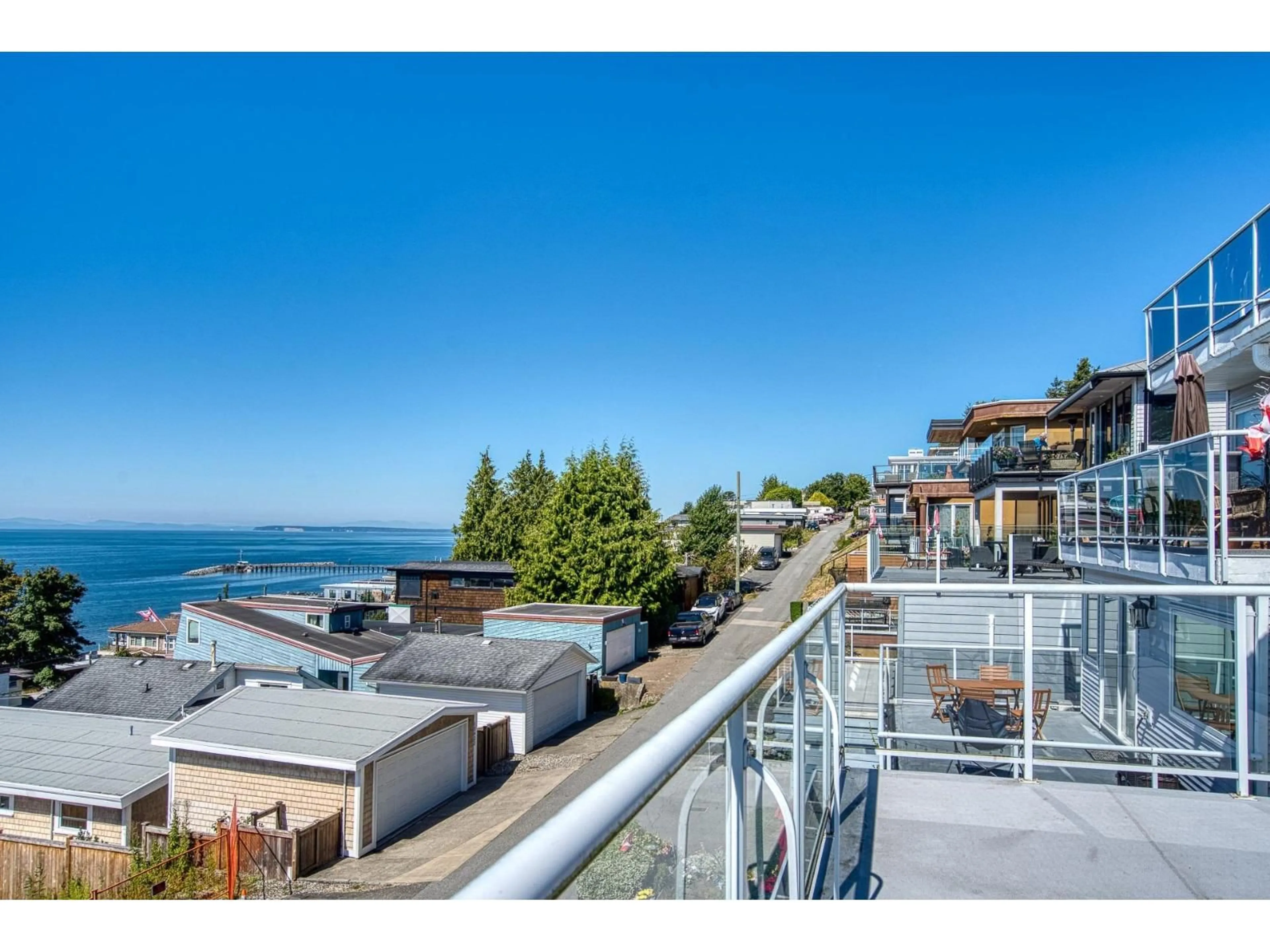 A pic from outside/outdoor area/front of a property/back of a property/a pic from drone, water/lake/river/ocean view for 15464 COLUMBIA, White Rock British Columbia V4B1K2