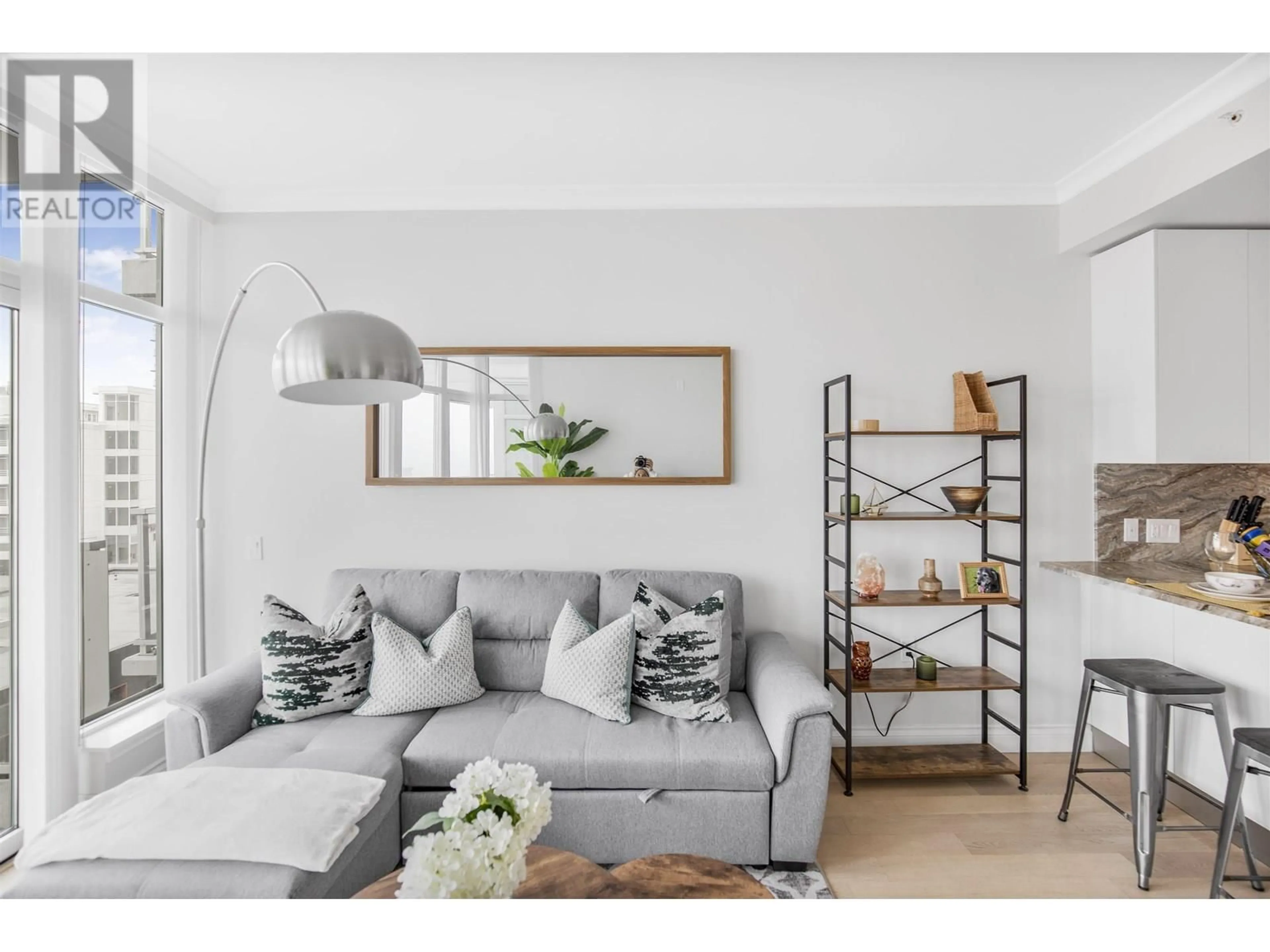 Living room with furniture, unknown for 809 - 175 VICTORY SHIP WAY, North Vancouver British Columbia V7L0G1