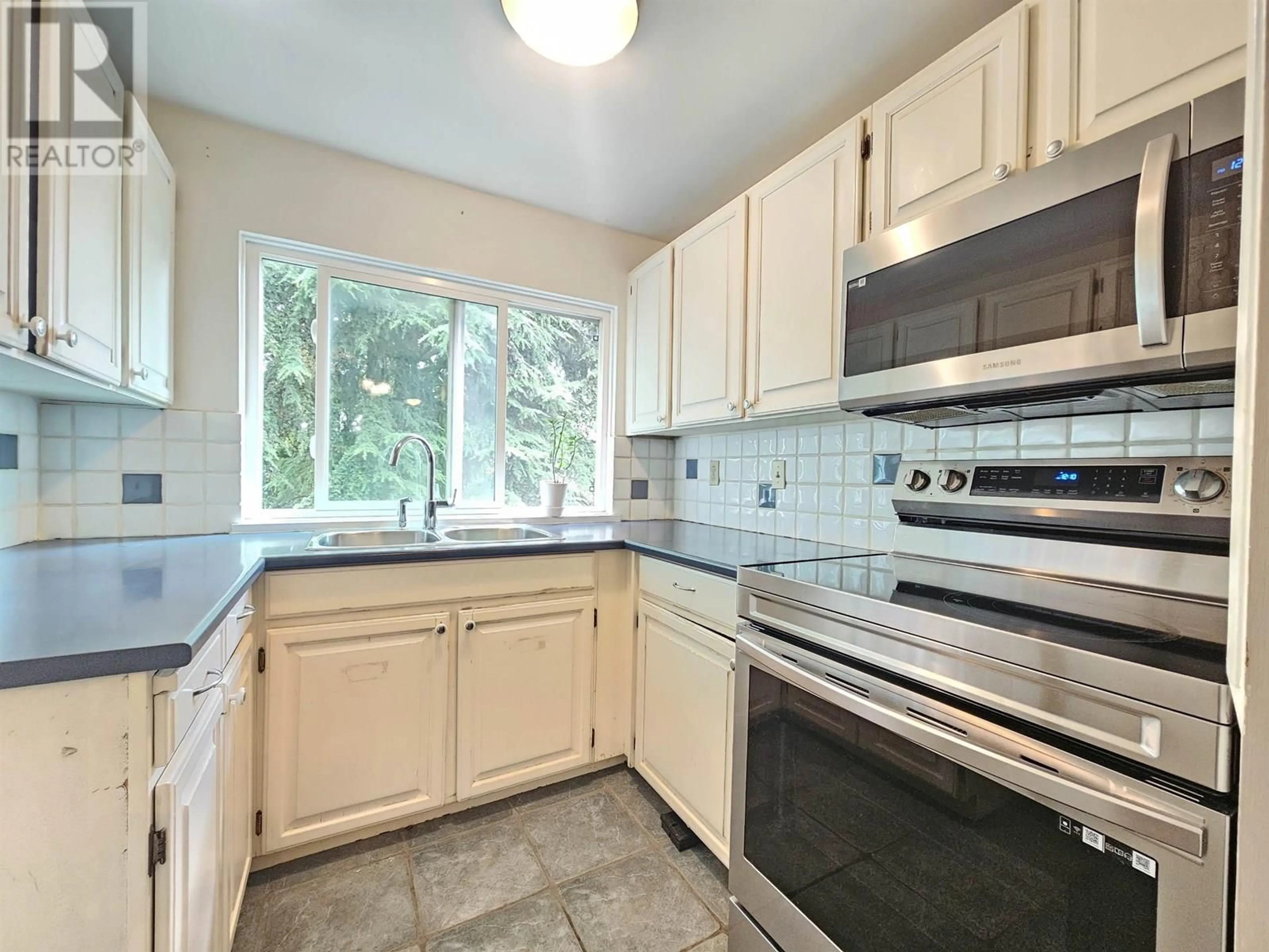 Standard kitchen, ceramic/tile floor for 304 - 8707 HUDSON STREET, Vancouver British Columbia V6P4M7