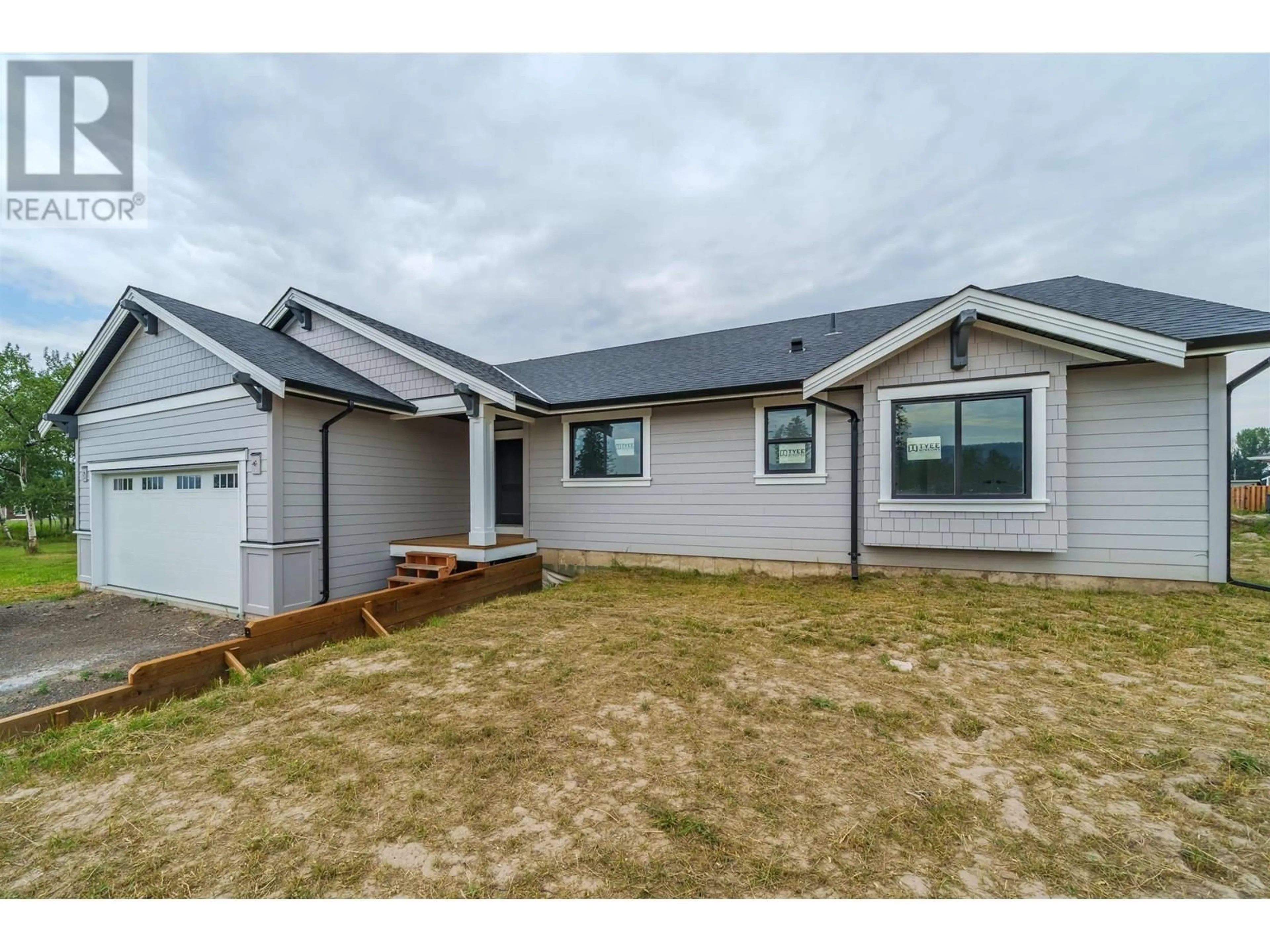 Home with vinyl exterior material, street for 345 SANDHILL CRESCENT, 100 Mile House British Columbia V0K2E1