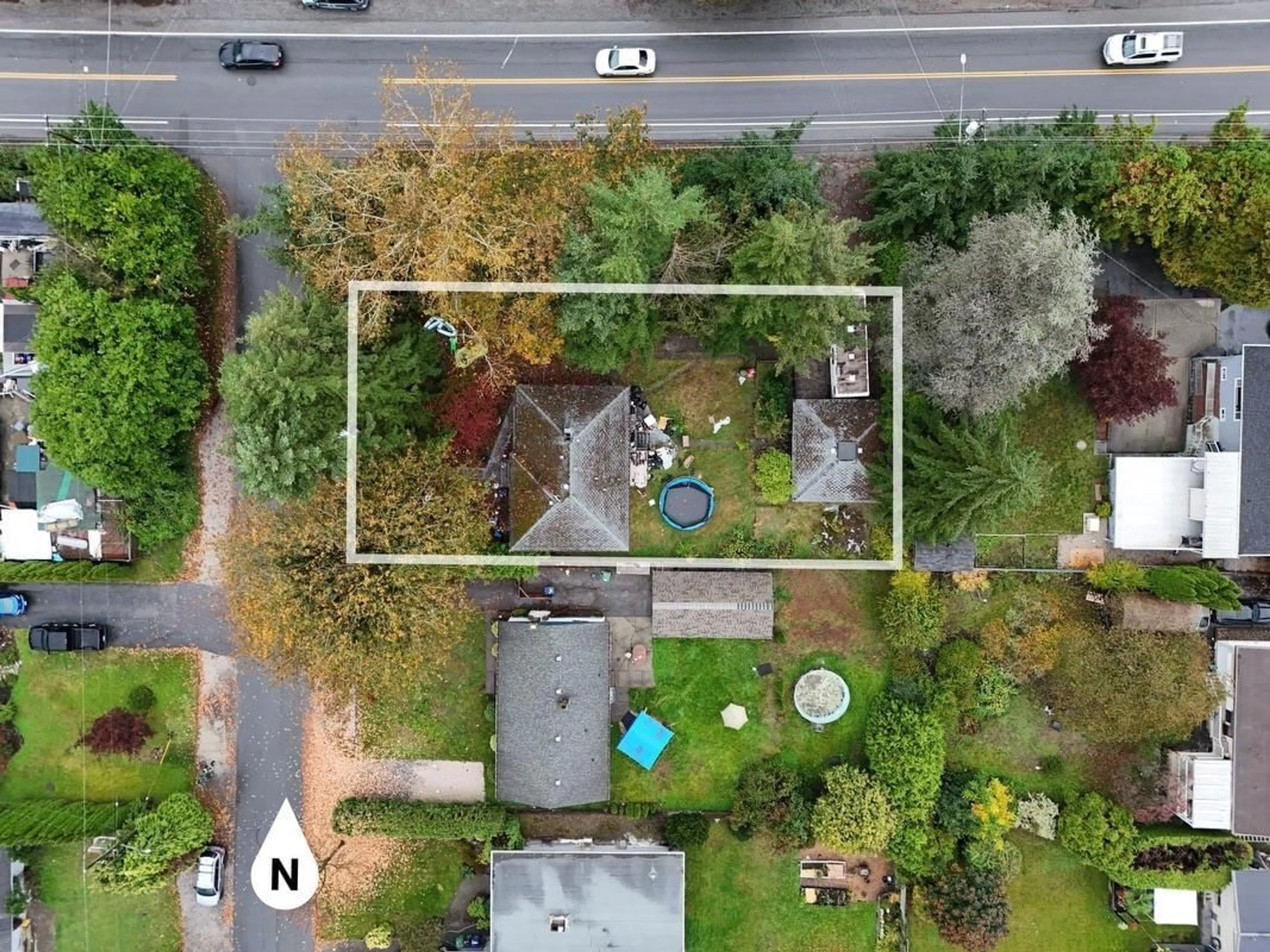 A pic from outside/outdoor area/front of a property/back of a property/a pic from drone, street for 10386 126, Surrey British Columbia V3V5E9