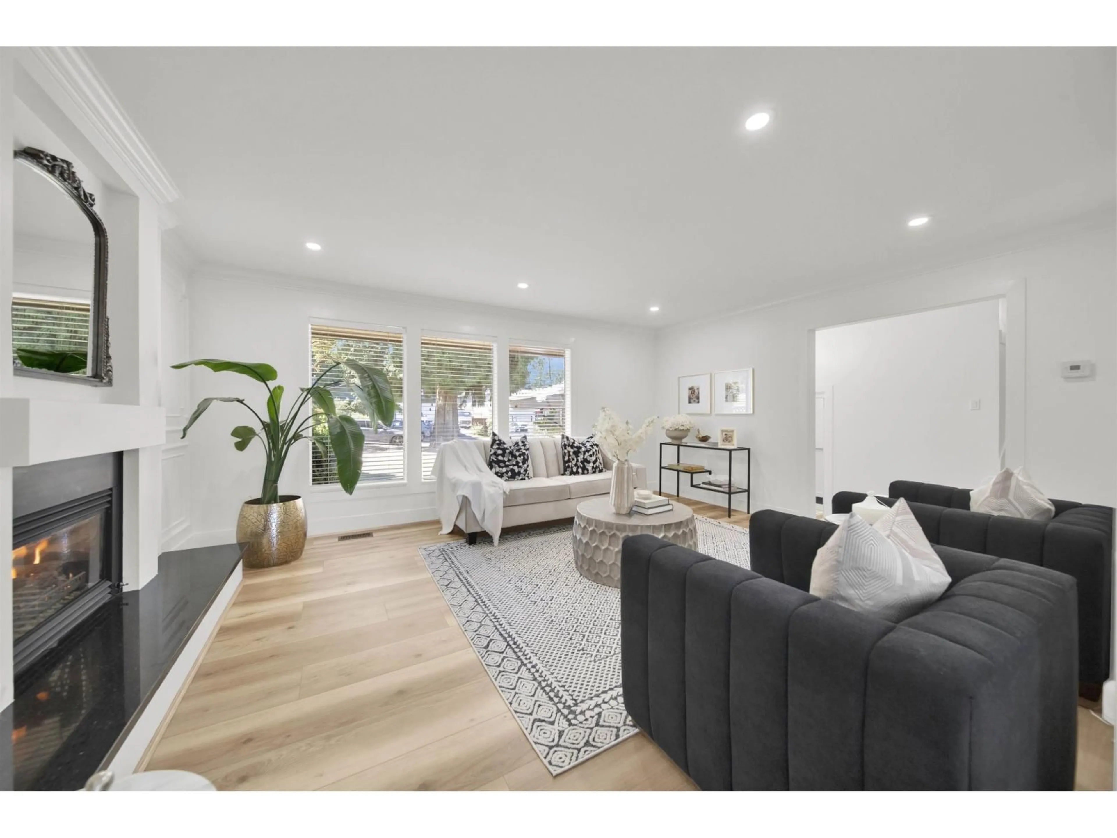 Living room with furniture, wood/laminate floor for 11473 ROYAL, Surrey British Columbia V3V6V5