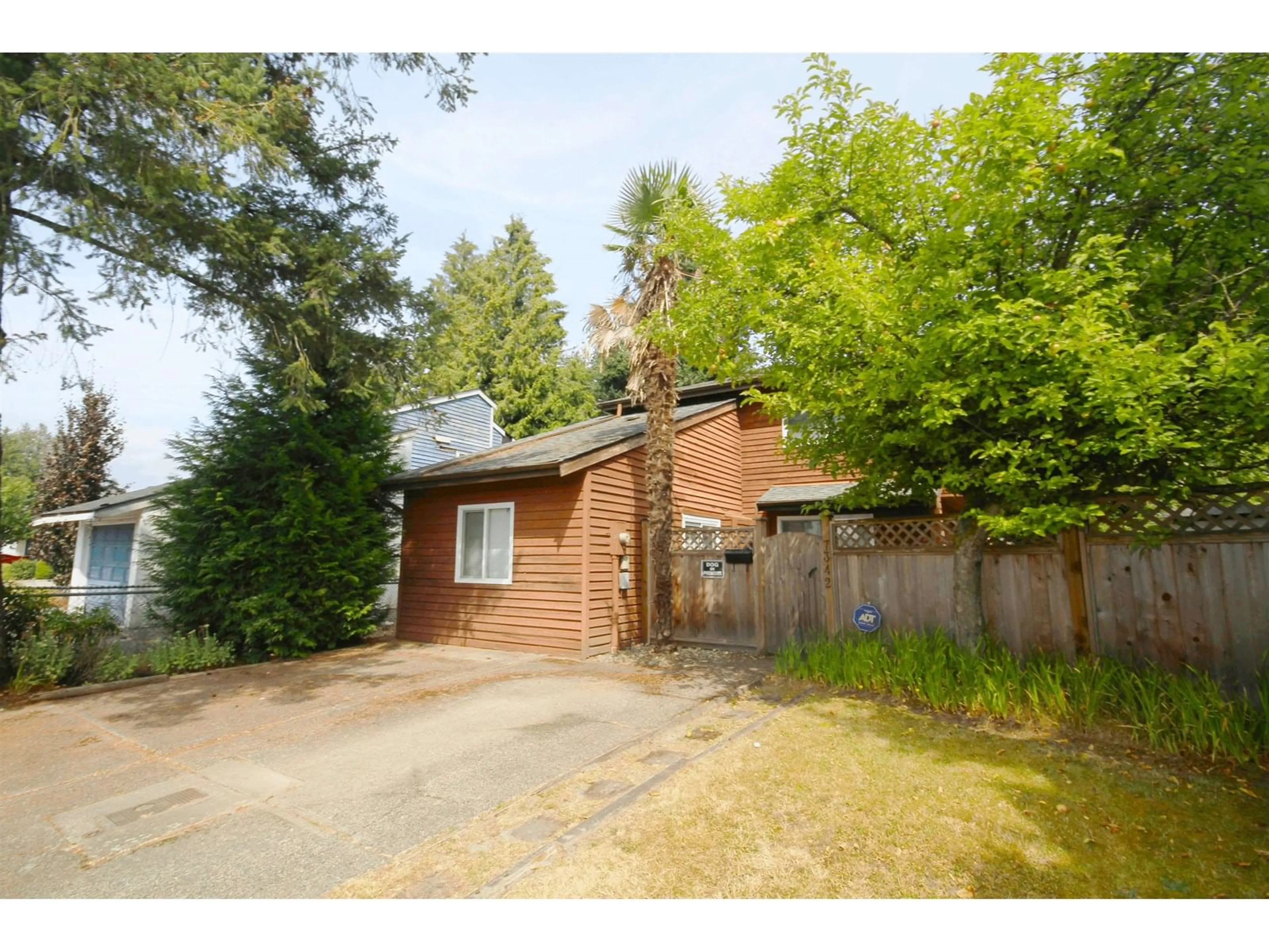 A pic from outside/outdoor area/front of a property/back of a property/a pic from drone, street for 7342 128B, Surrey British Columbia V3W7E5