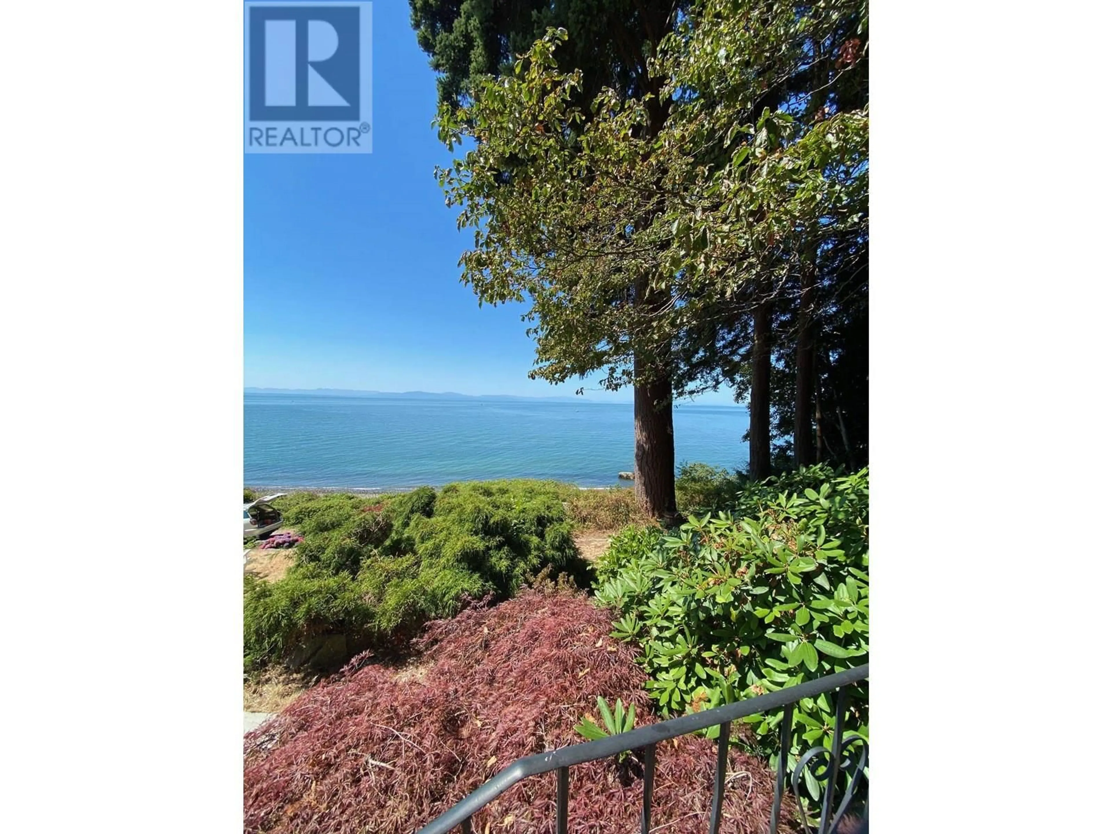 A pic from outside/outdoor area/front of a property/back of a property/a pic from drone, water/lake/river/ocean view for 1714 OCEAN BEACH, Gibsons British Columbia V0N1V5