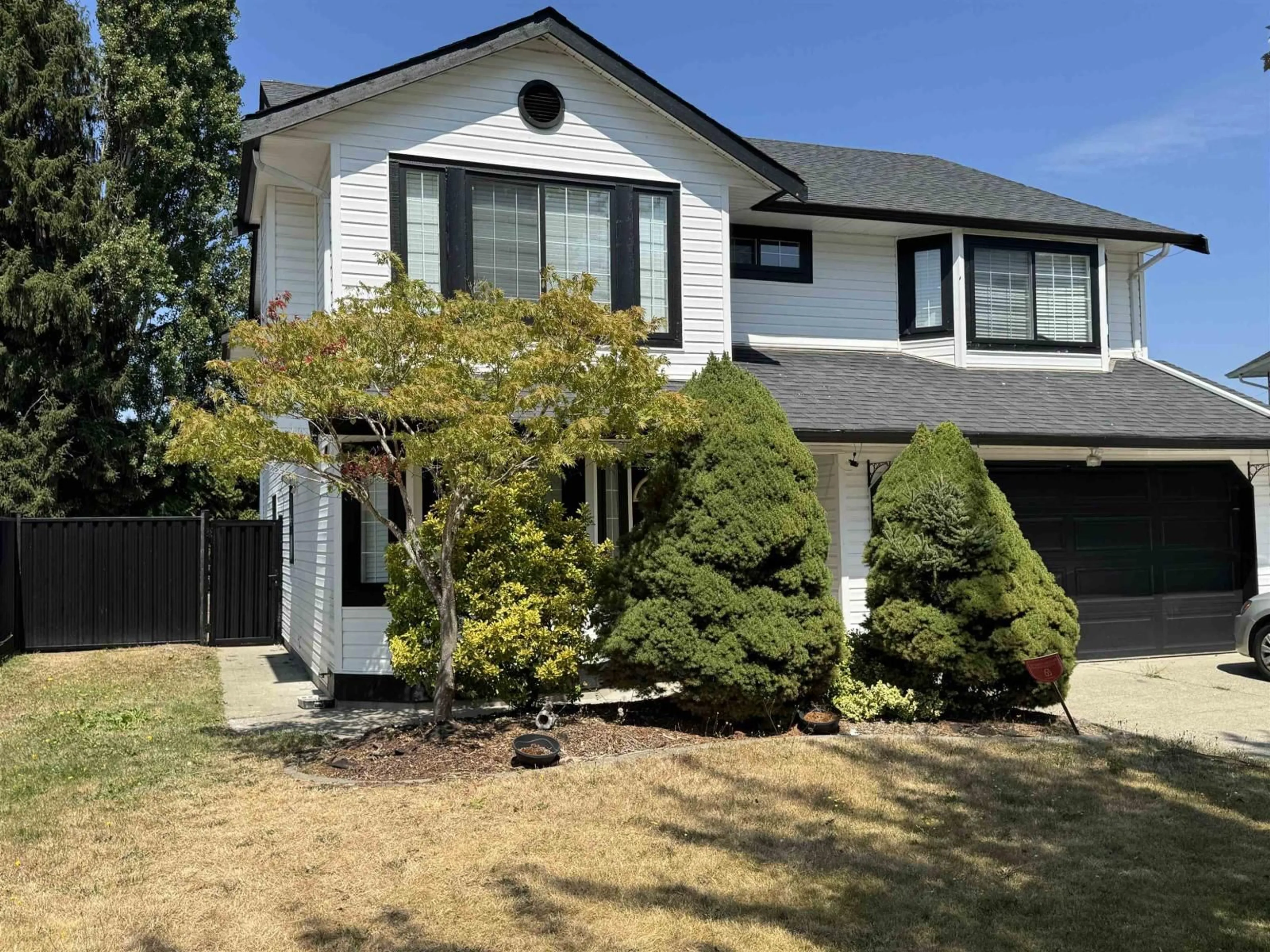 Home with vinyl exterior material, street for 21499 51B, Langley British Columbia V3A5B8