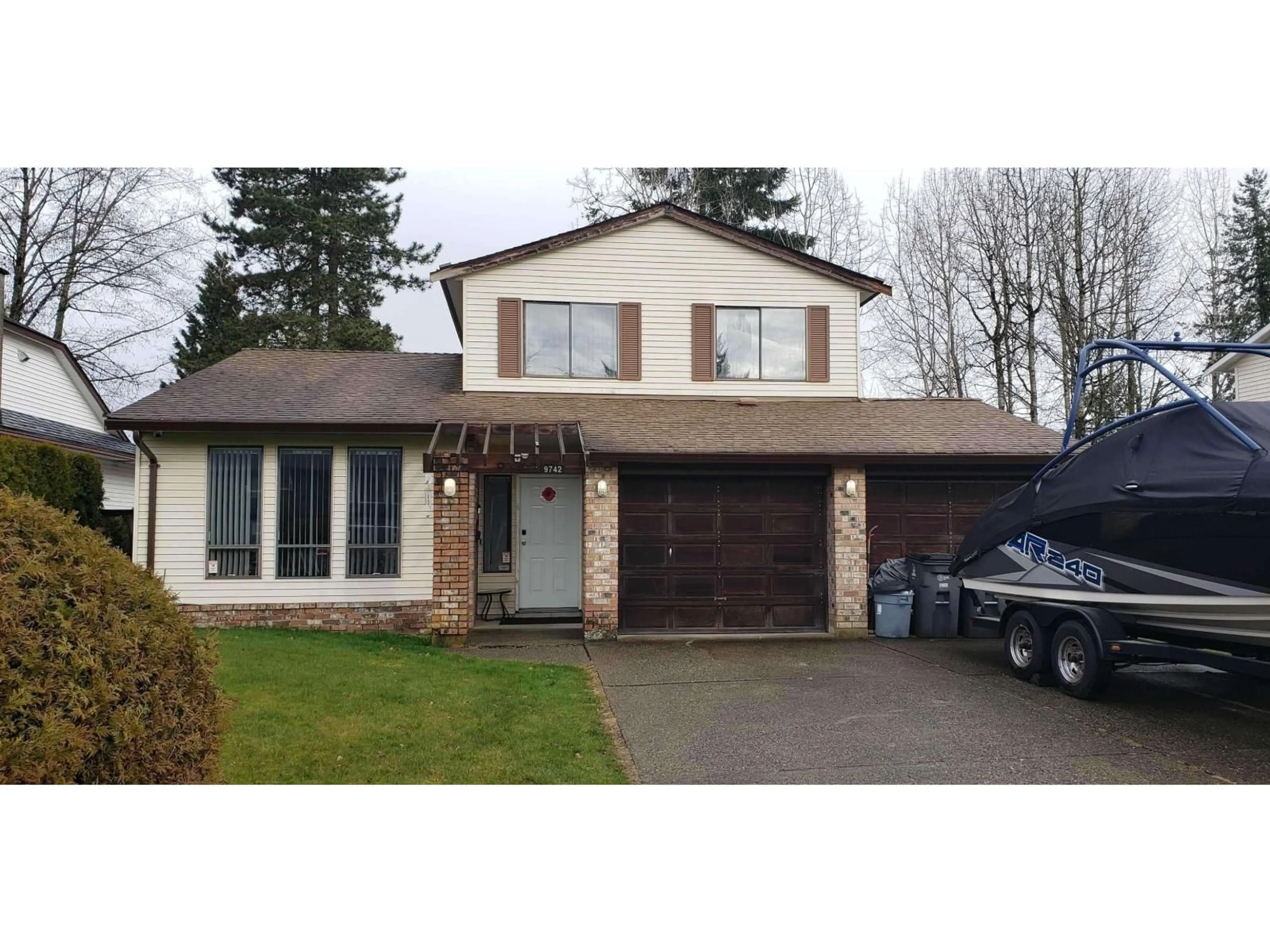 Home with vinyl exterior material, street for 9742 149, Surrey British Columbia V3R8C6