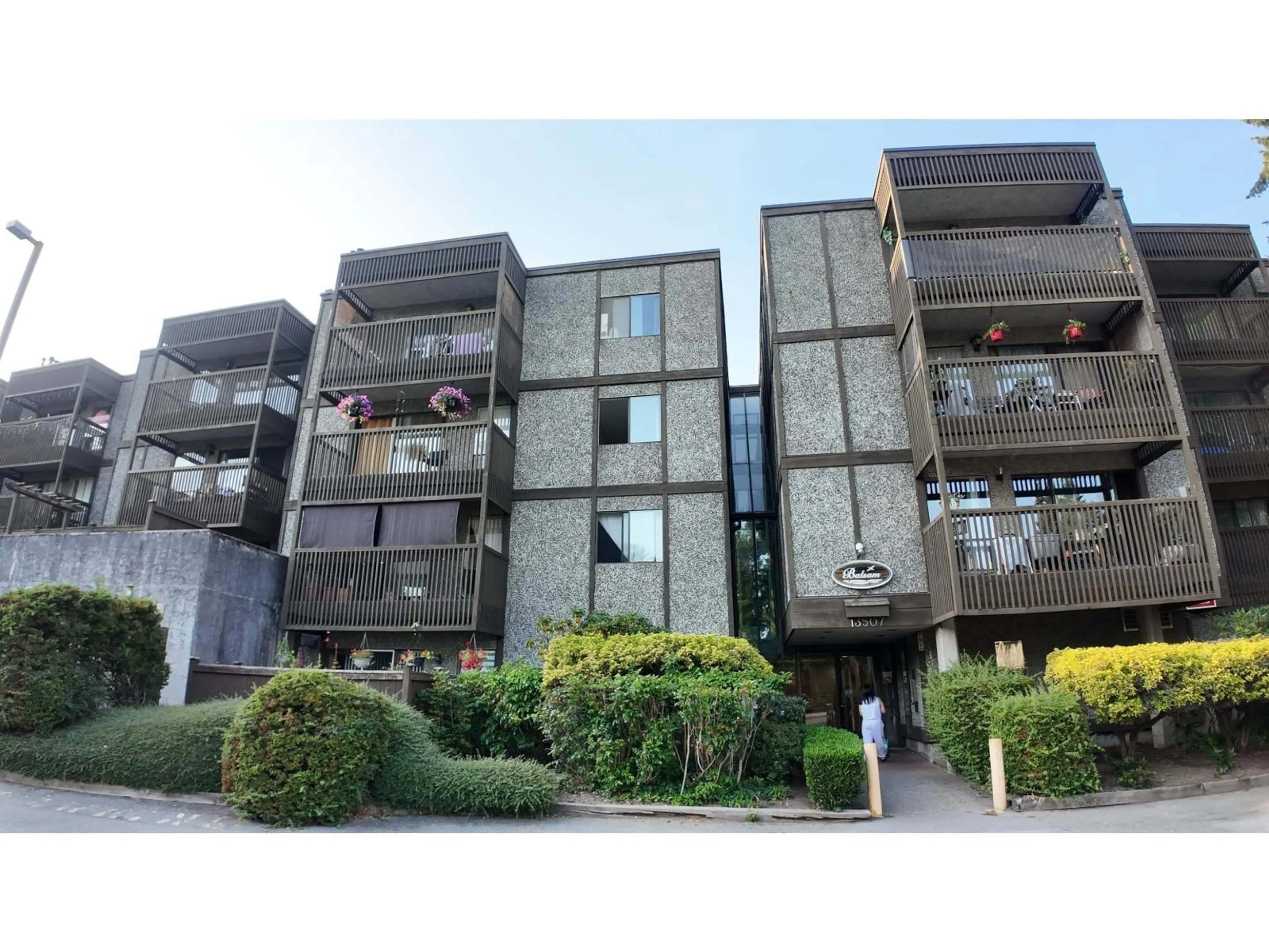 A pic from outside/outdoor area/front of a property/back of a property/a pic from drone, building for 111 - 13507 96, Surrey British Columbia V3V7P3