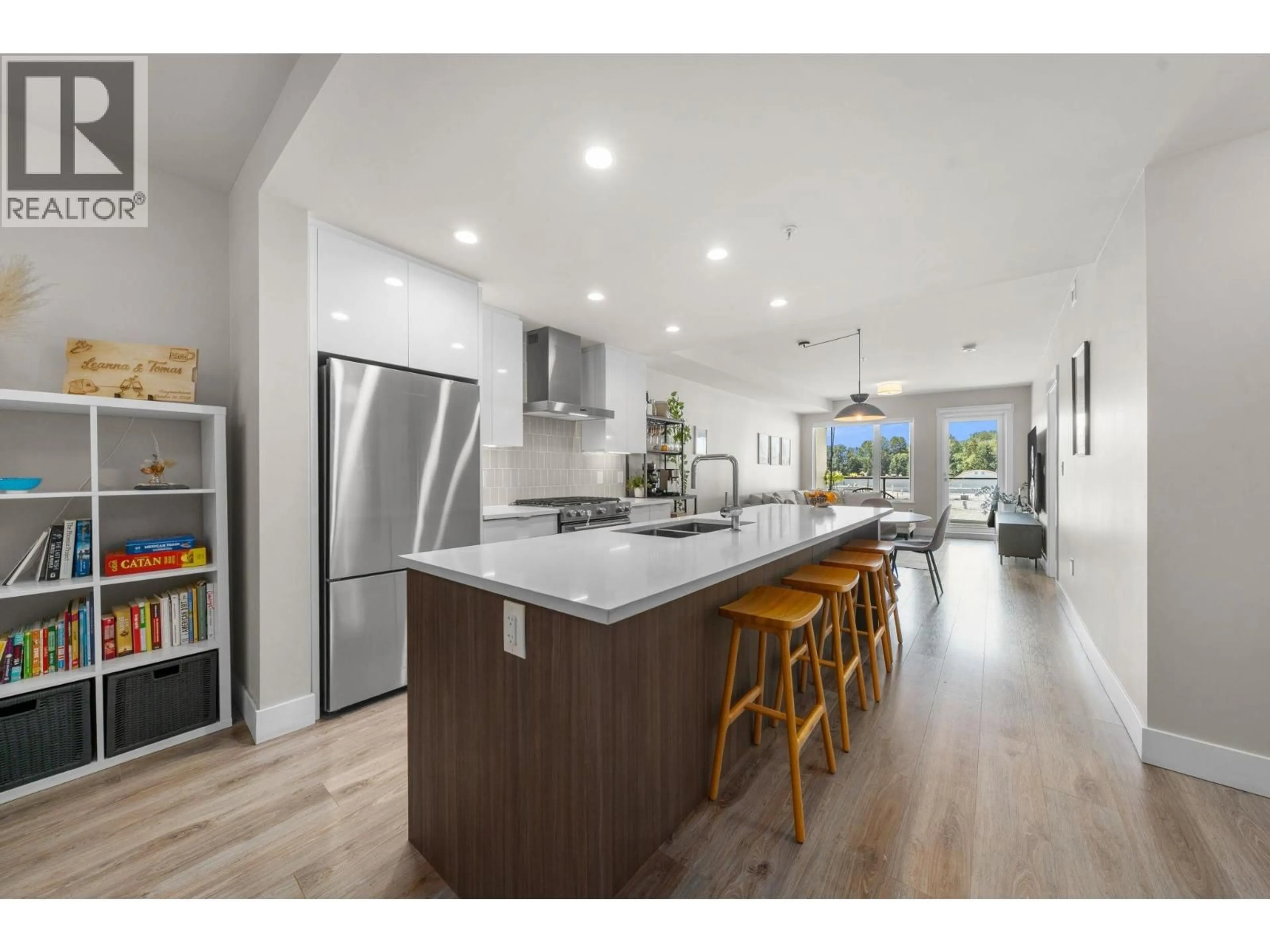 Open concept kitchen, wood/laminate floor for 302 - 1496 CHARLOTTE ROAD, North Vancouver British Columbia V7J0C9