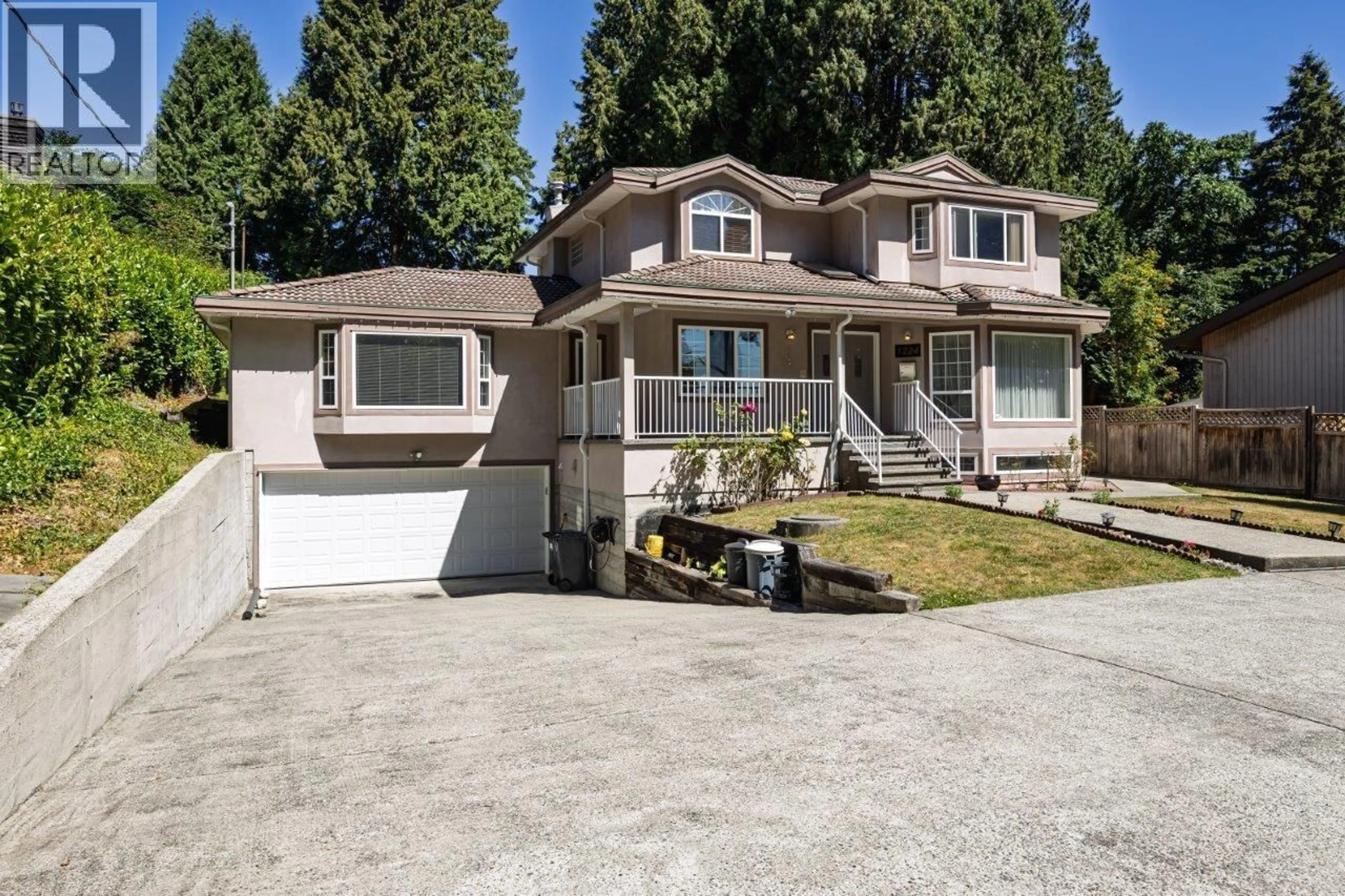 Home with vinyl exterior material, street for 1224 14TH STREET, North Vancouver British Columbia V7J1K2