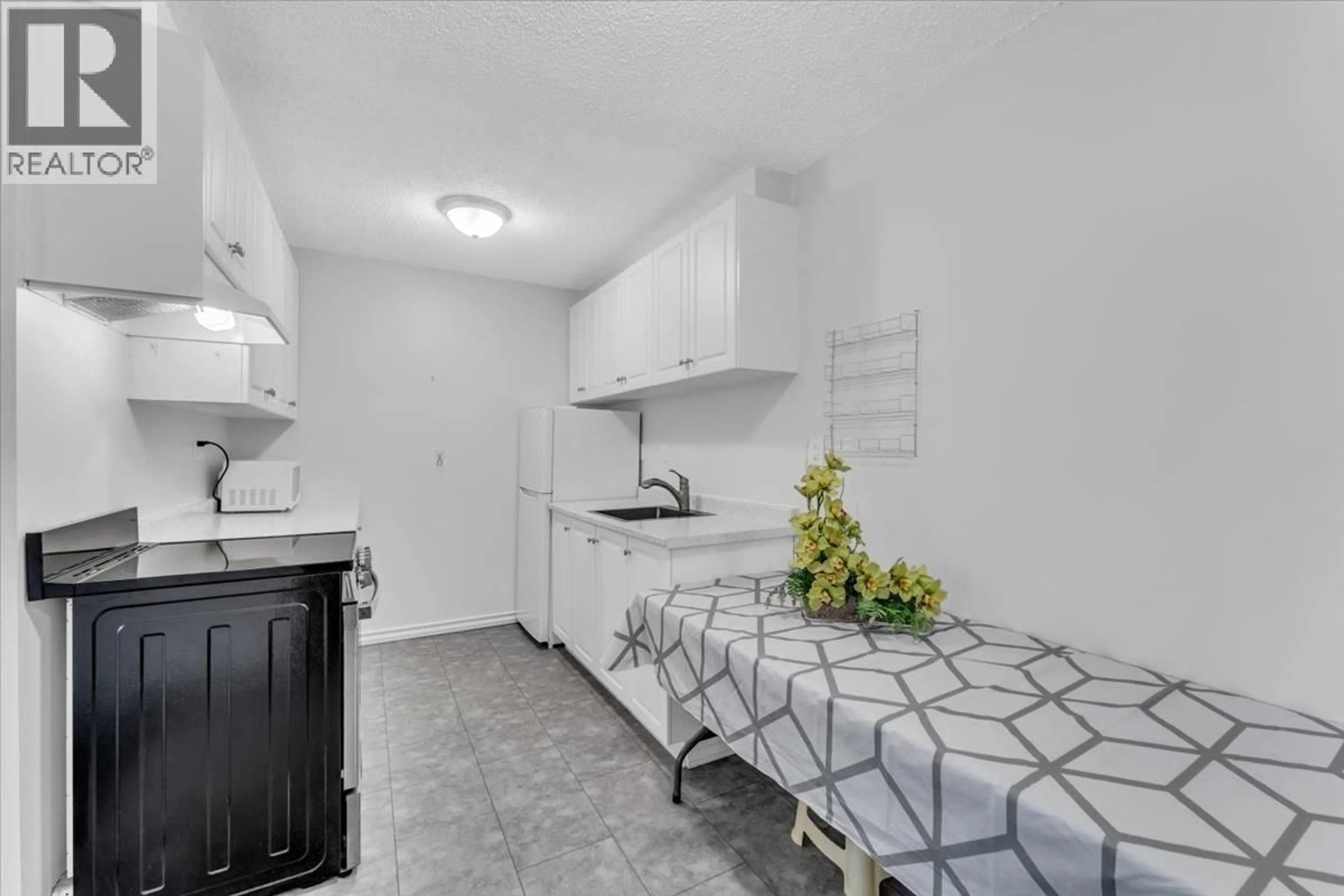 Standard kitchen, ceramic/tile floor for 208 - 7220 LINDSAY ROAD, Richmond British Columbia V7C3M6