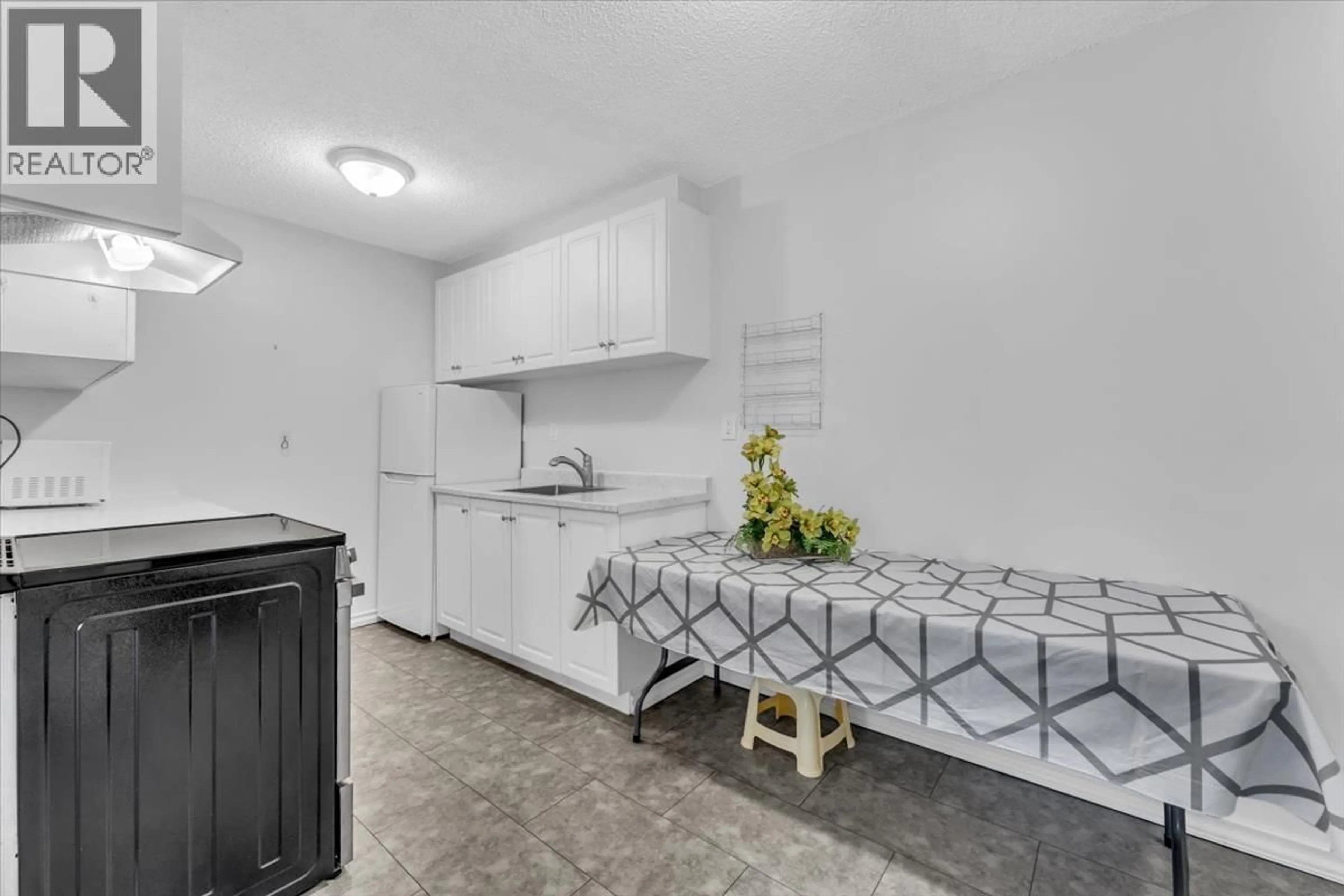 Standard kitchen, ceramic/tile floor for 208 - 7220 LINDSAY ROAD, Richmond British Columbia V7C3M6