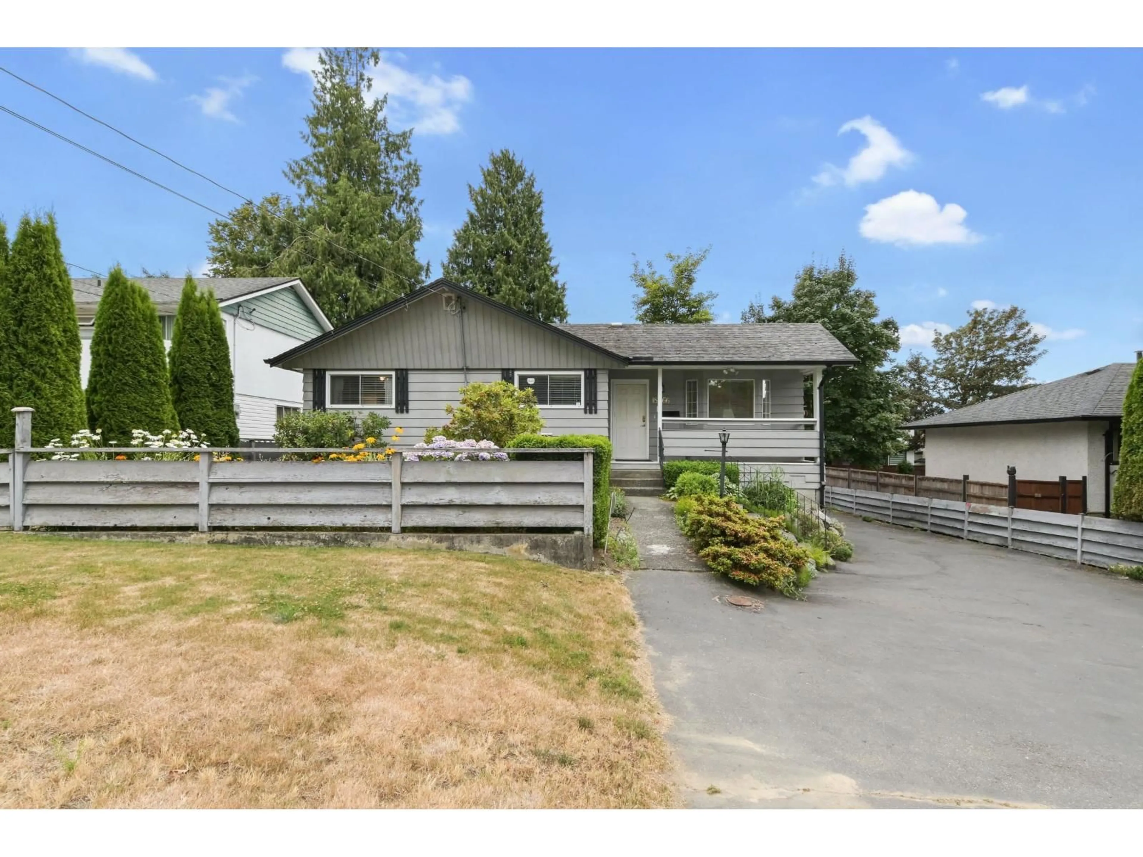 Home with vinyl exterior material, street for 18066 59, Surrey British Columbia V3S1P7