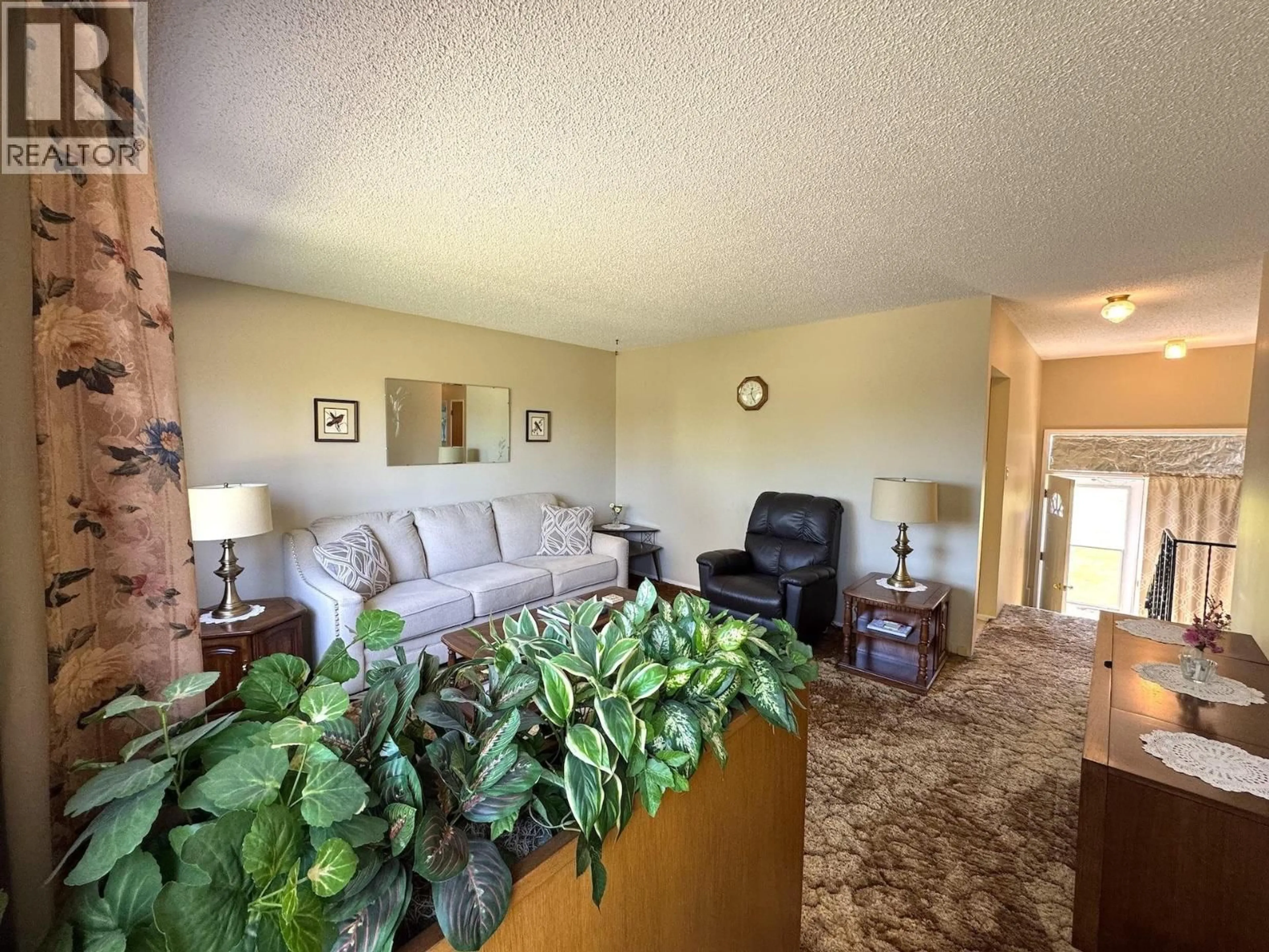 Living room with furniture, unknown for 9703 112 AVENUE, Fort St. John British Columbia V1J2W1