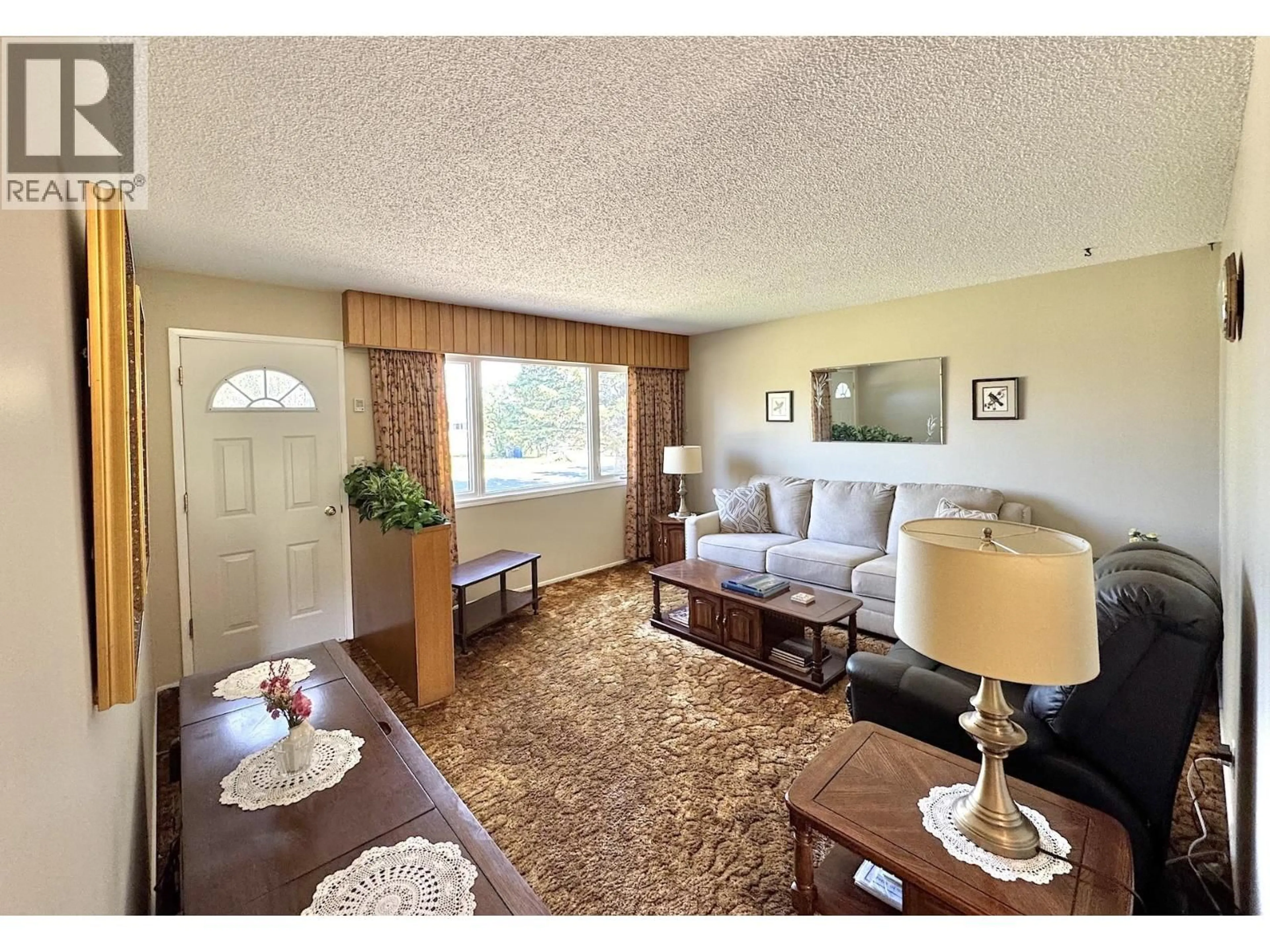 Living room with furniture, unknown for 9703 112 AVENUE, Fort St. John British Columbia V1J2W1