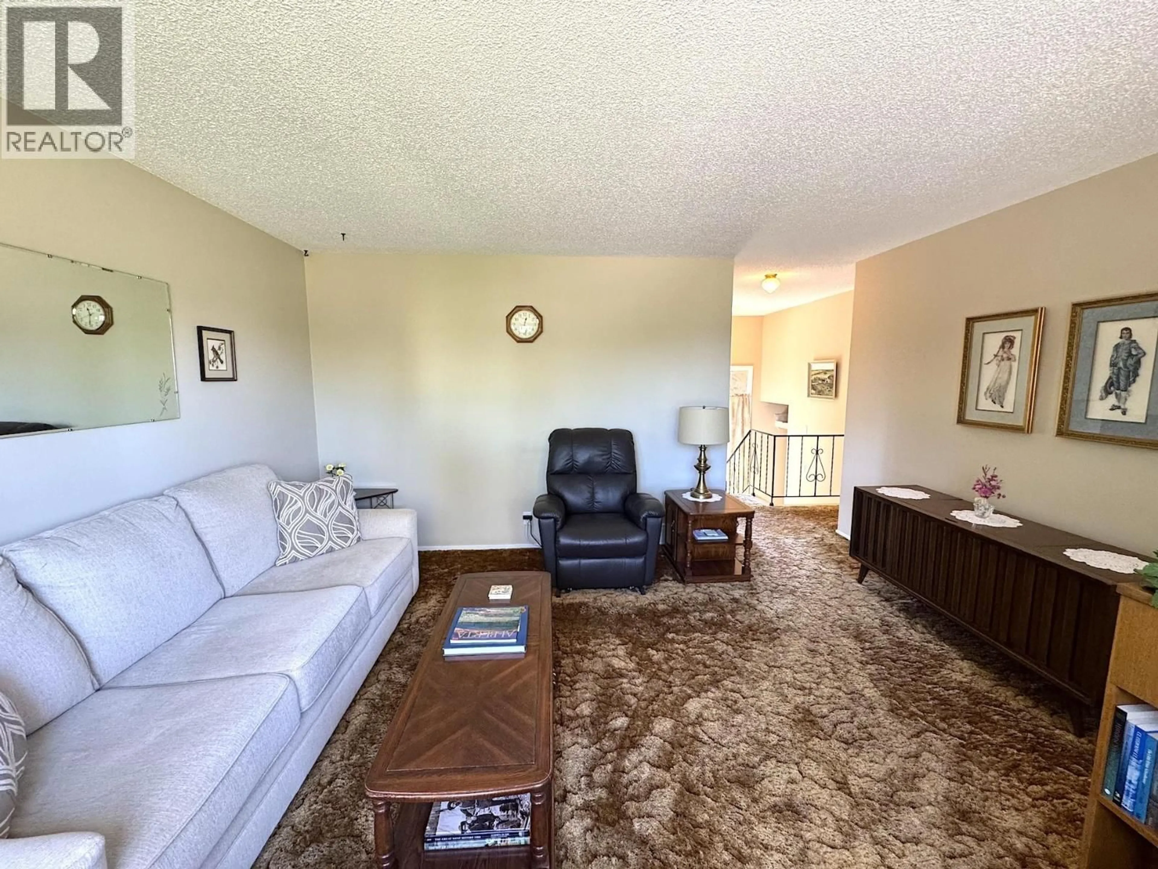 Living room with furniture, unknown for 9703 112 AVENUE, Fort St. John British Columbia V1J2W1