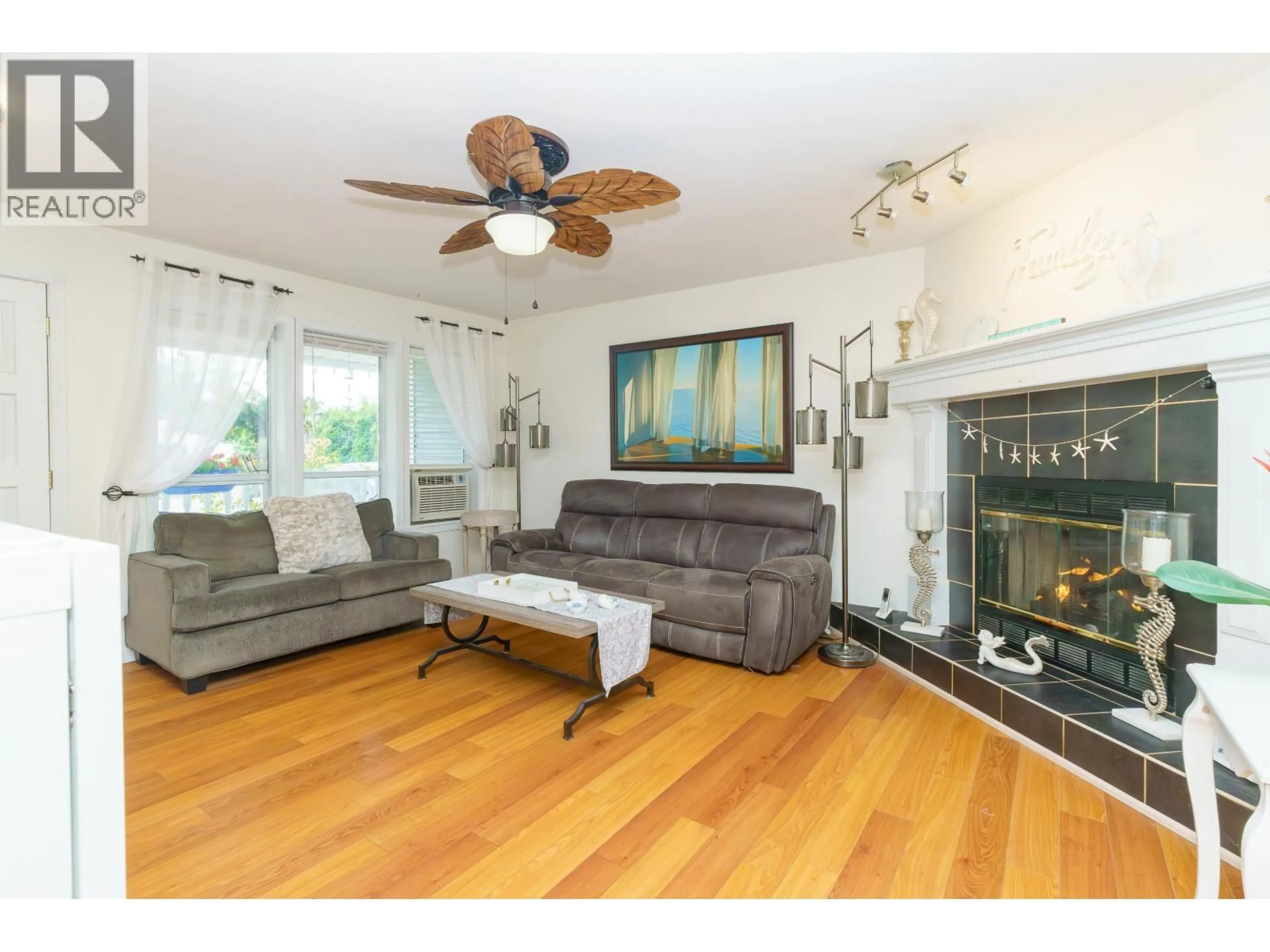 Living room with furniture, wood/laminate floor for 23765 119B AVENUE, Maple Ridge British Columbia V4R1V9