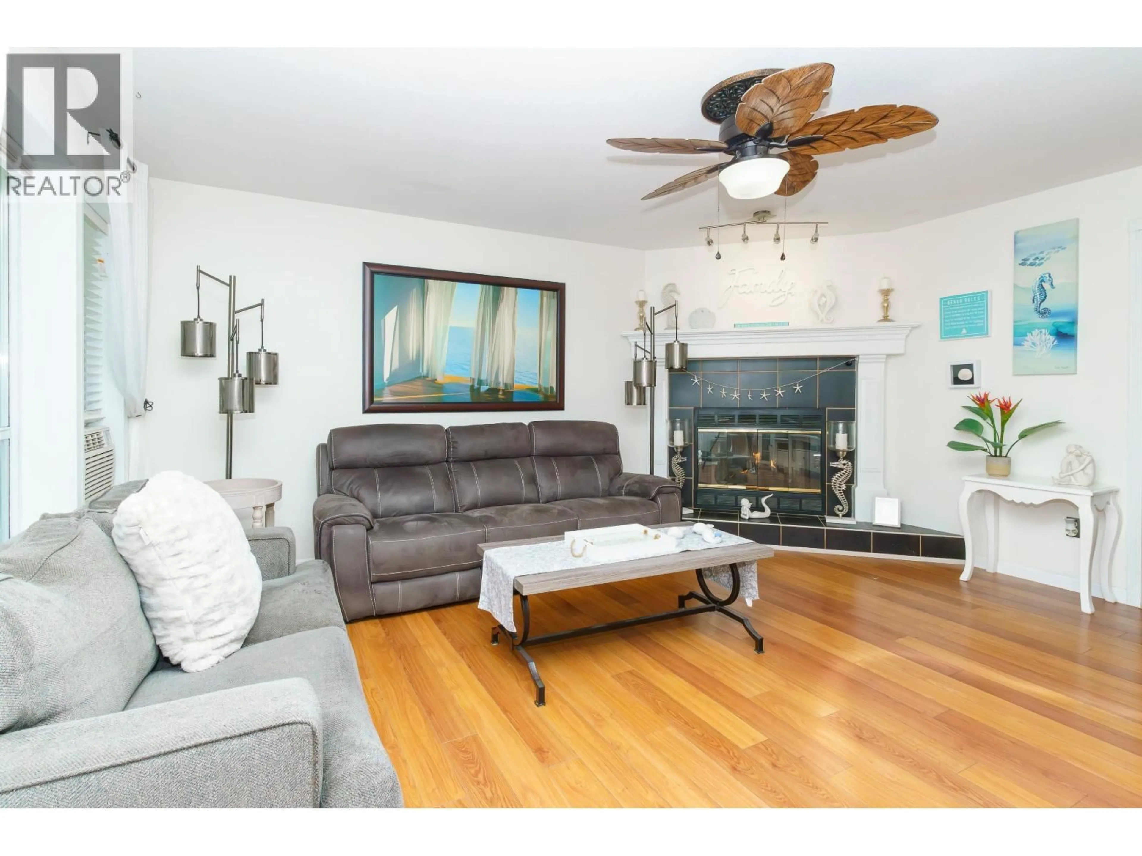 Living room with furniture, wood/laminate floor for 23765 119B AVENUE, Maple Ridge British Columbia V4R1V9