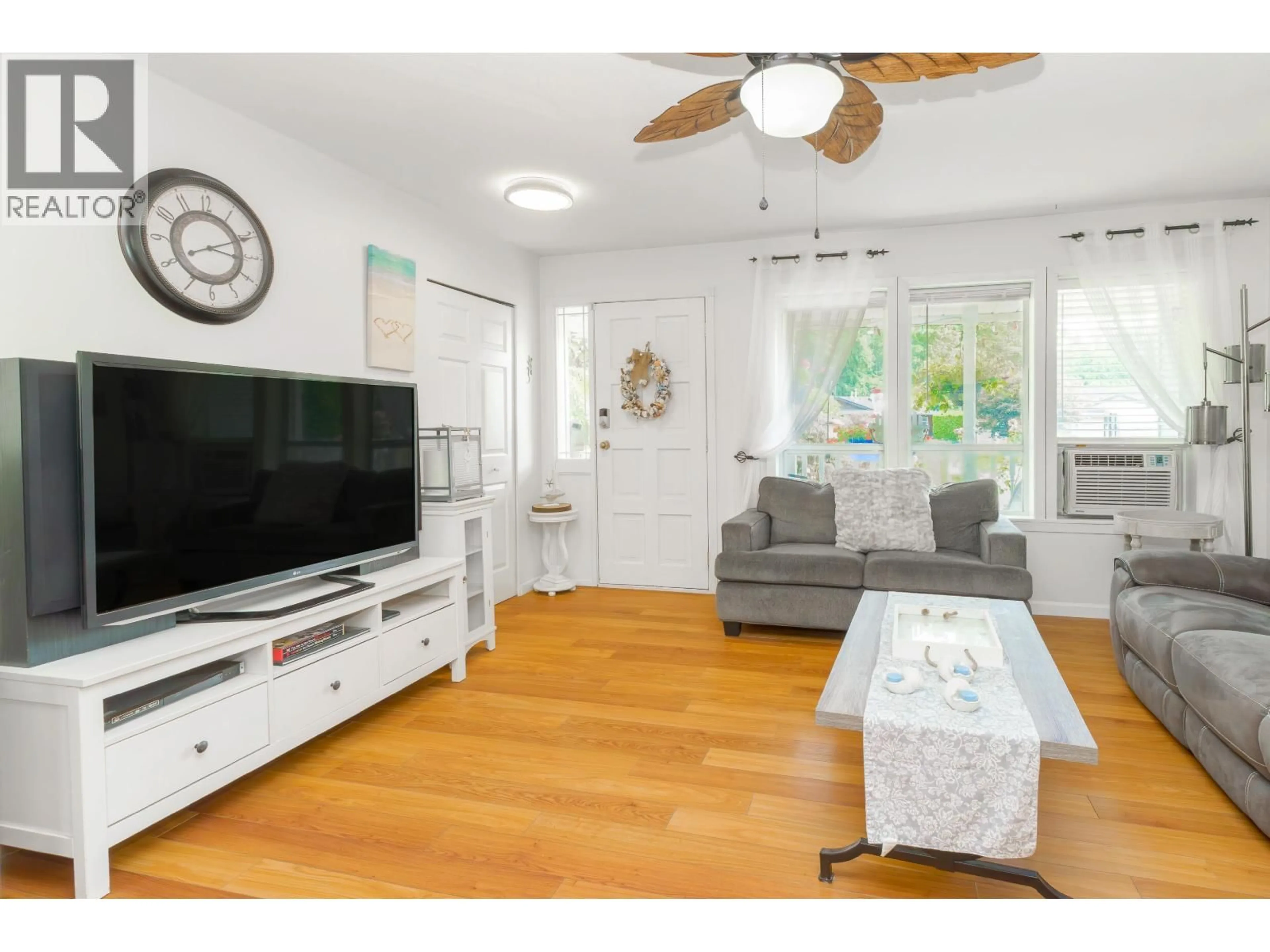Living room with furniture, wood/laminate floor for 23765 119B AVENUE, Maple Ridge British Columbia V4R1V9