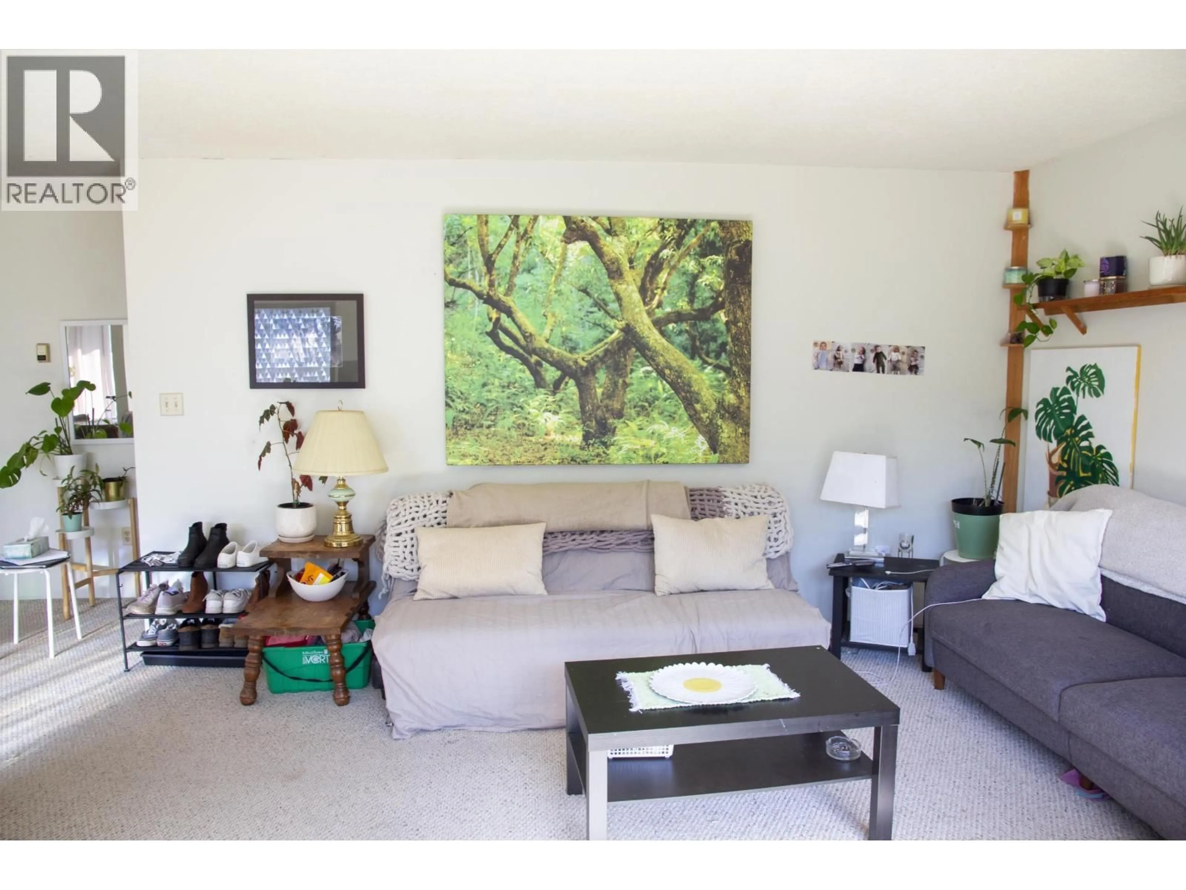 Living room with furniture, wood/laminate floor for 5754 BINNACLE AVENUE, Sechelt British Columbia V7Z0R4