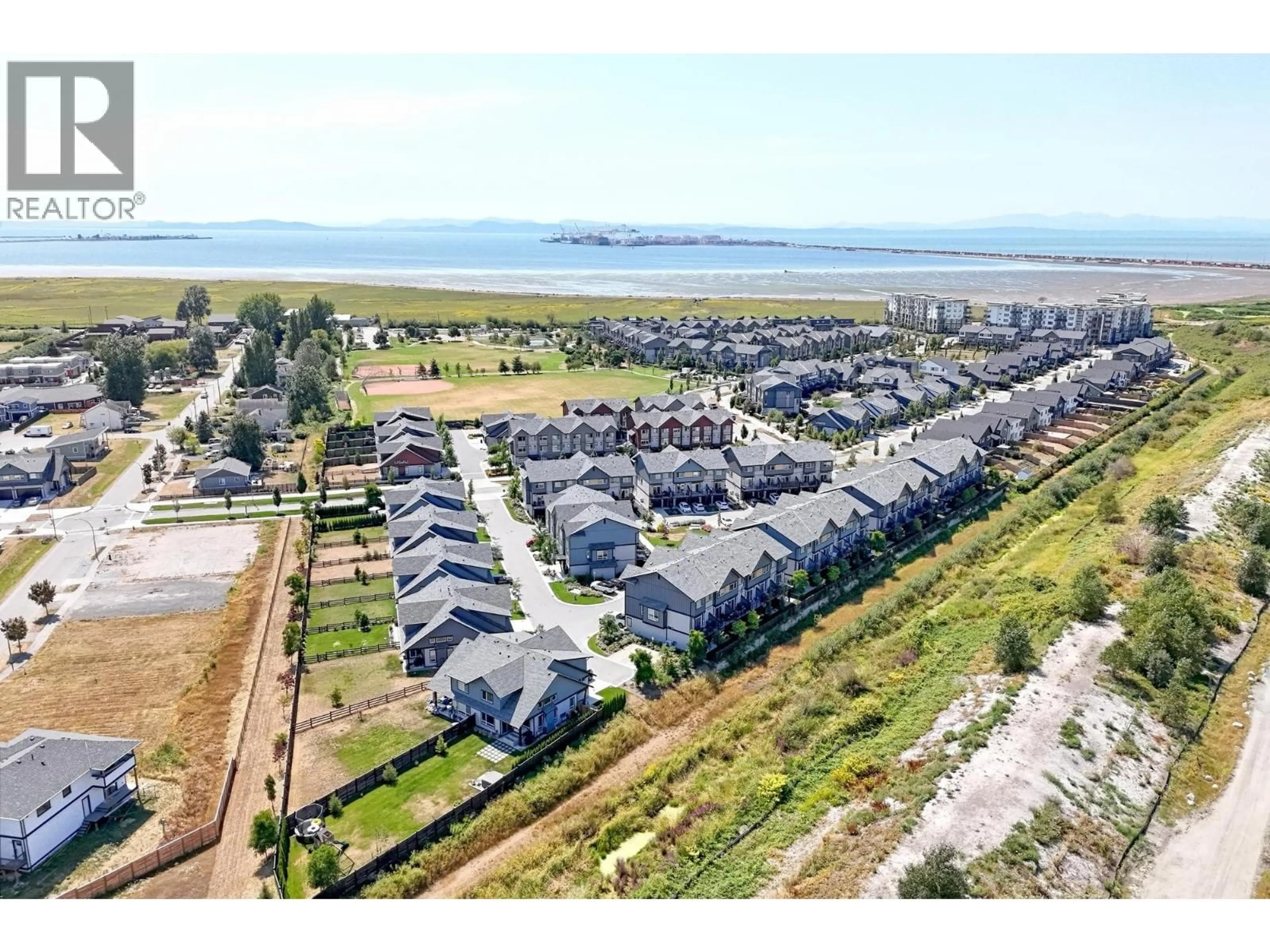 A pic from outside/outdoor area/front of a property/back of a property/a pic from drone, water/lake/river/ocean view for 35 - 4375 CORMORANT WAY, Delta British Columbia V4M0G3