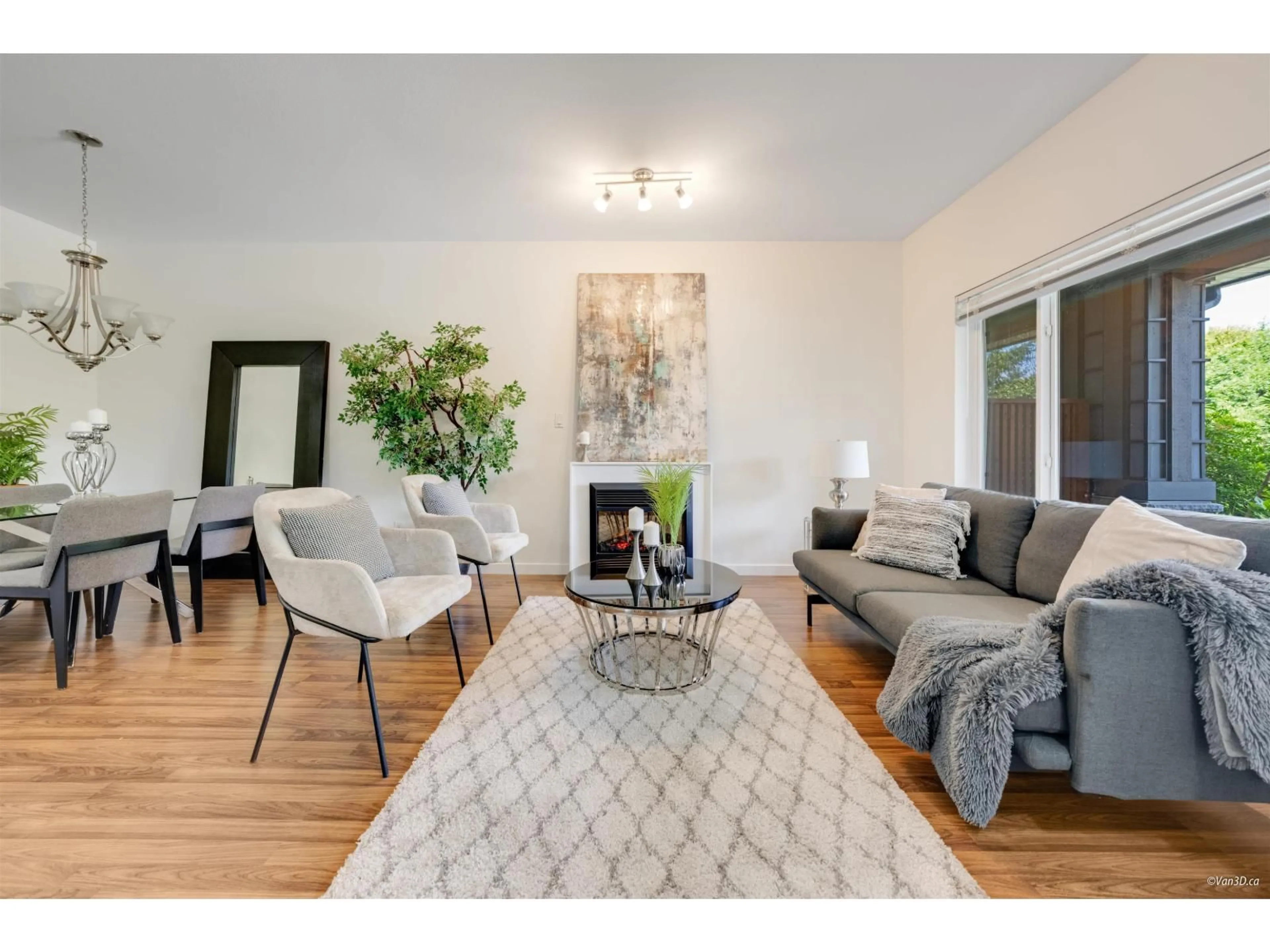 Living room with furniture, wood/laminate floor for 15 - 18701 66, Surrey British Columbia V3S4P3
