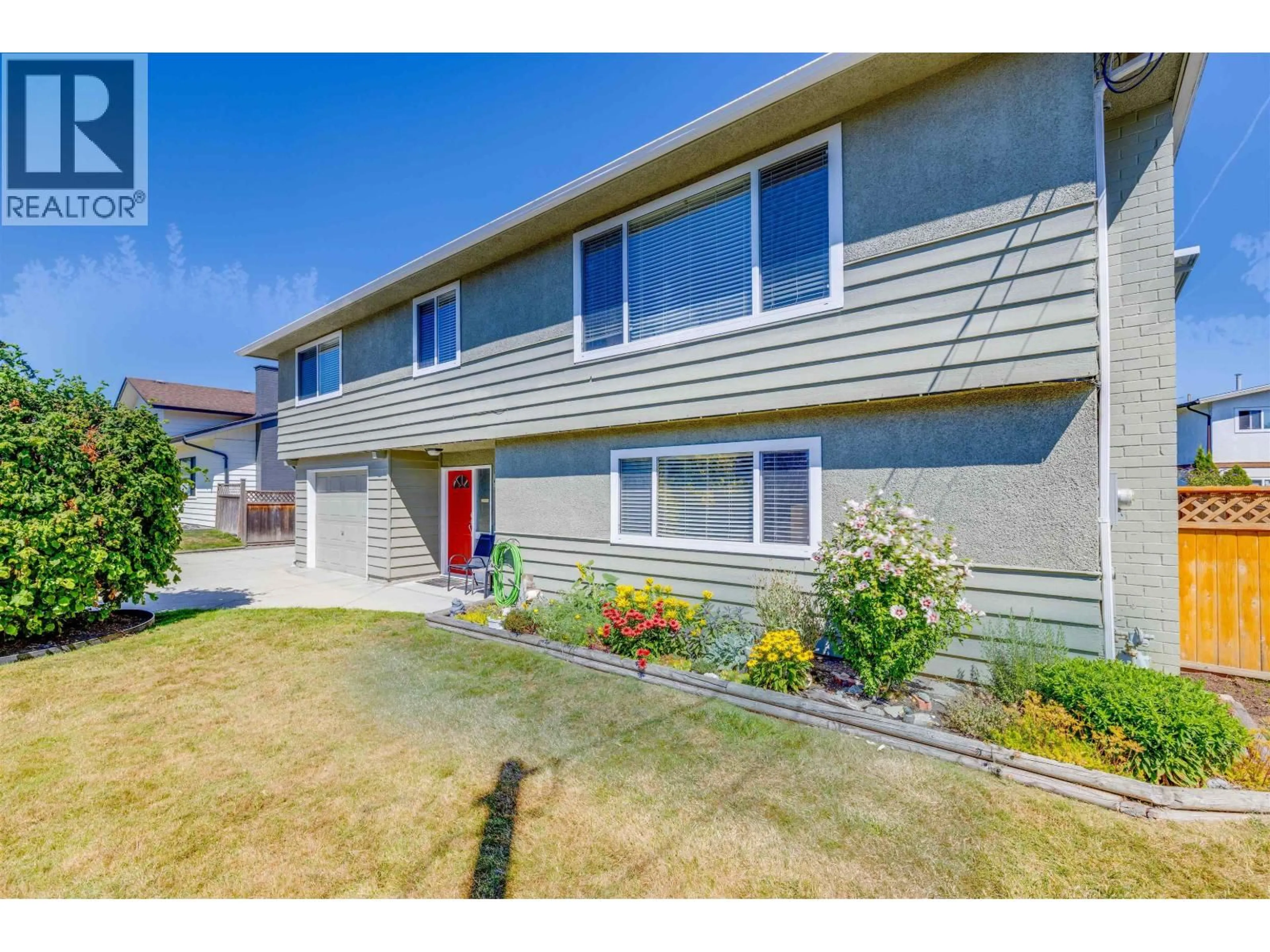 Home with vinyl exterior material, street for 4882 58 STREET, Ladner British Columbia V4K3H5